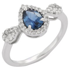 Blue Sapphire Engagement Ring, Ringed with Diamonds in 18K White Gold 