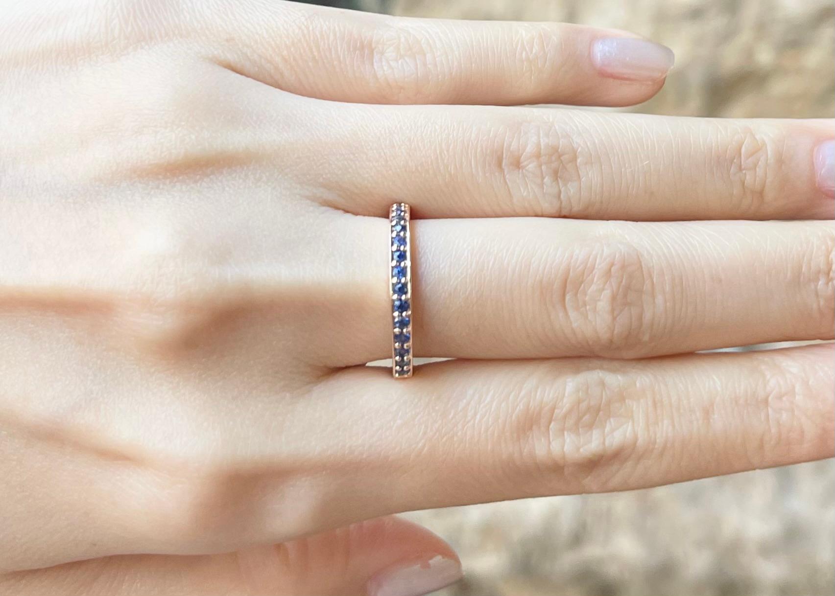 Contemporary Blue Sapphire Eternity Band Ring set in 18K Rose Gold Settings For Sale