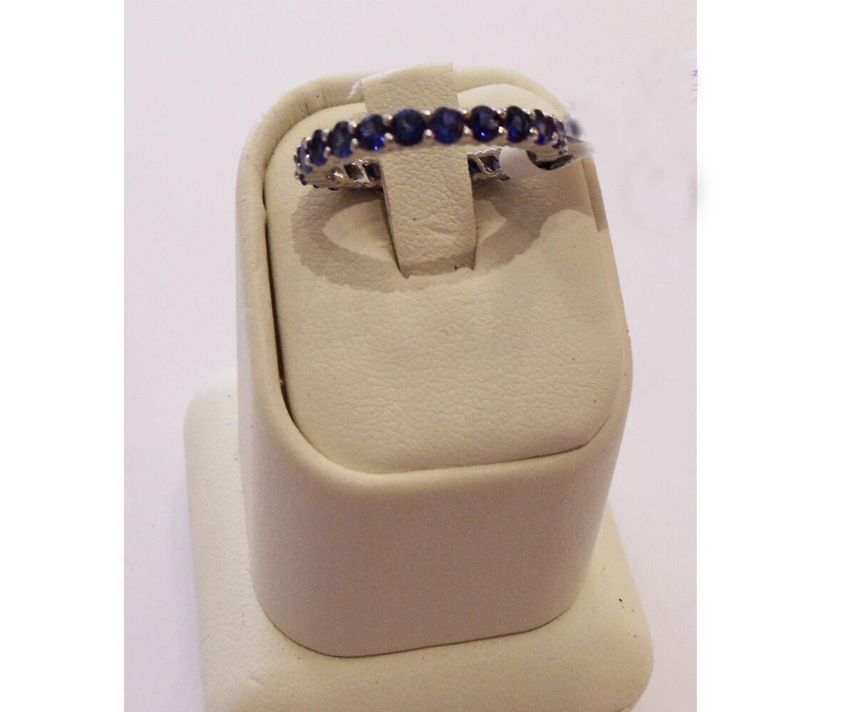 Blue Sapphire Eternity Band

24 Round Blue Sapphires, AA Quality

Total Carat Weight 1.80 carats

Set in 18 Karat White Gold

ITEM DETAILS

    Item Number: J3038

Setting Information

    Metal: 18 Karat White Gold

Blue Sapphire Information

   