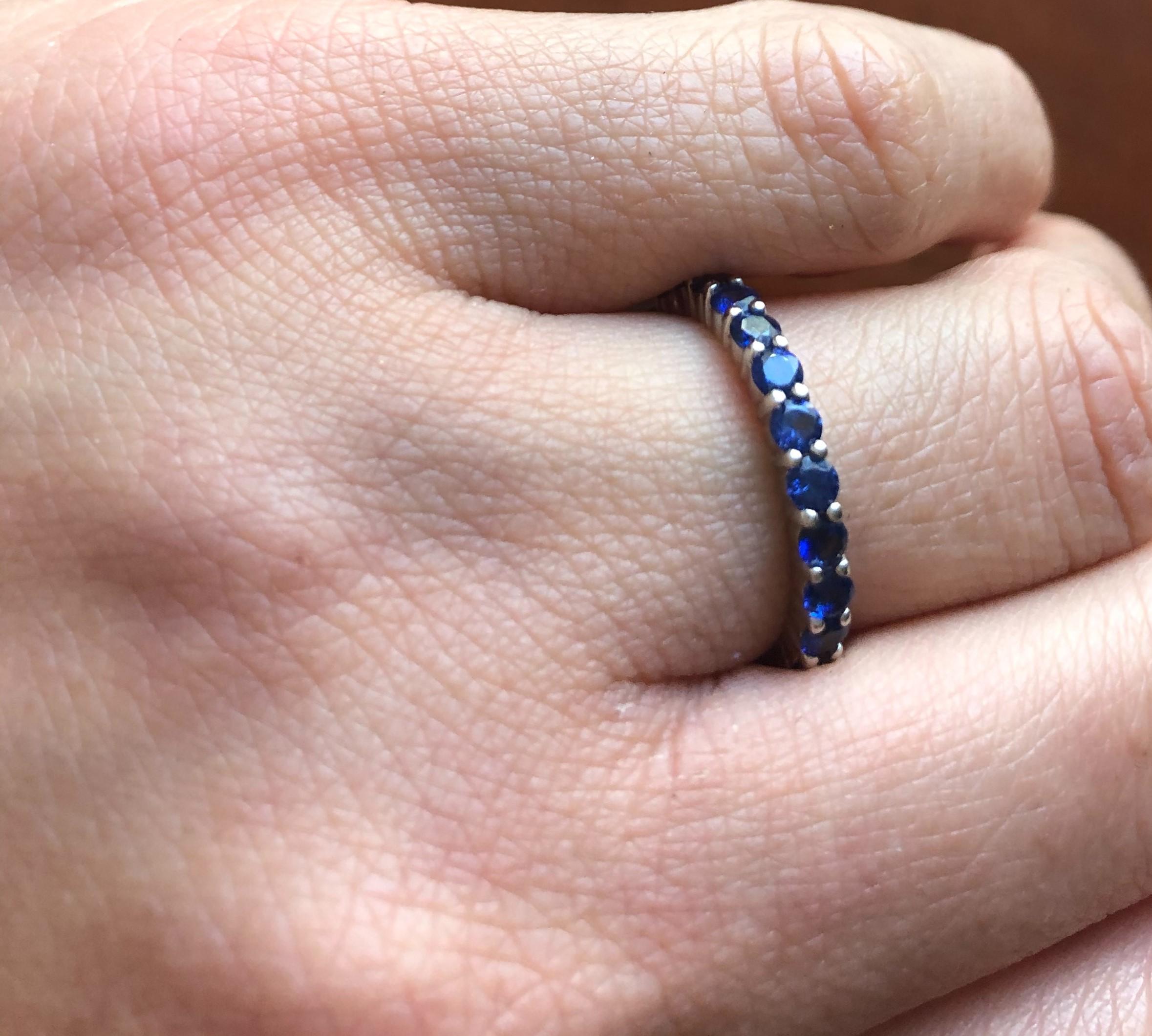 Contemporary Blue Sapphire Eternity Ring 18 Karat White Gold For Sale
