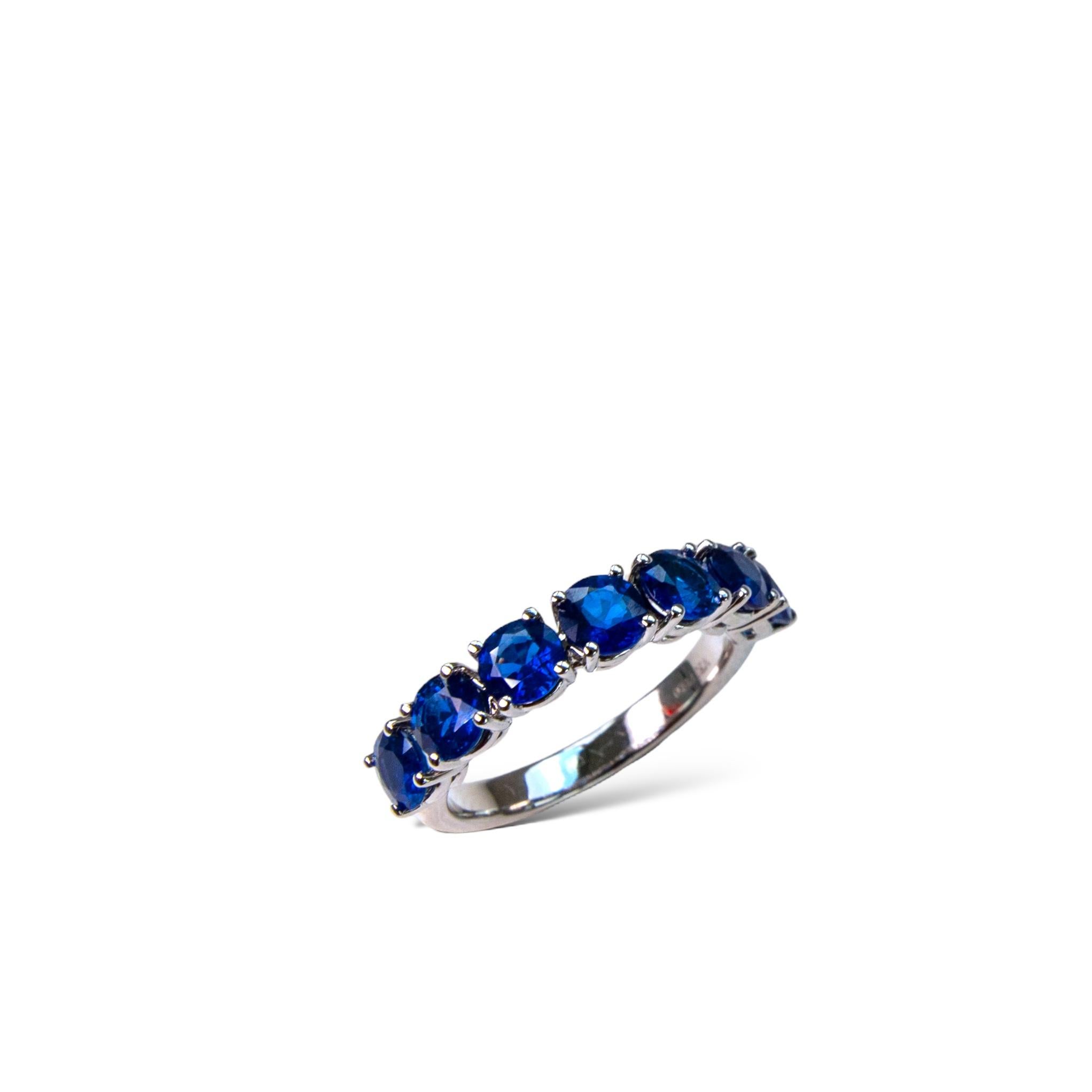 Beautiful Sri Lankan blue sapphire eternity ring featuring 7 round natural sapphires set in a solid platinum setting.

Sapphire is considered a lucky stone and is believed to attract calmness, abundance, and blessings.

This beautiful Ceylon
