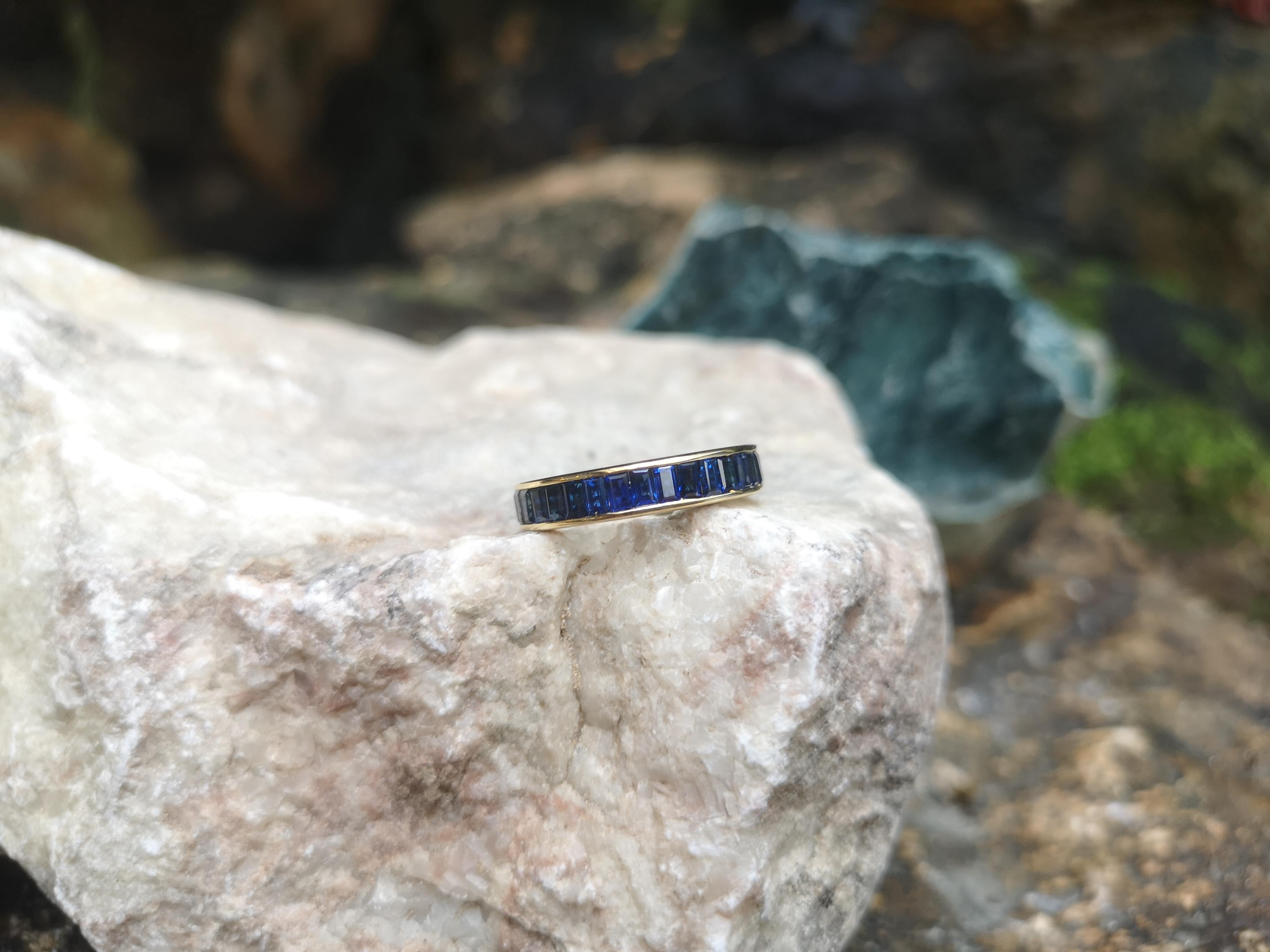 Contemporary Blue Sapphire Eternity Ring Set in 18 Karat Gold Settings For Sale