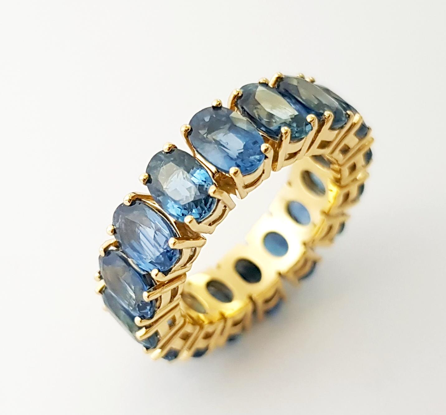 Bague d'éternité en or 18 carats sertie de saphirs bleus en vente 10