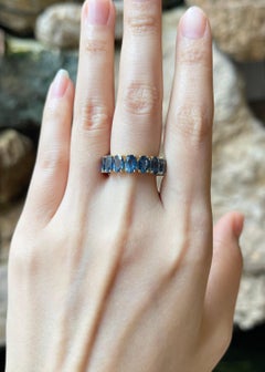 Blue Sapphire Eternity Ring set in 18K Gold Settings