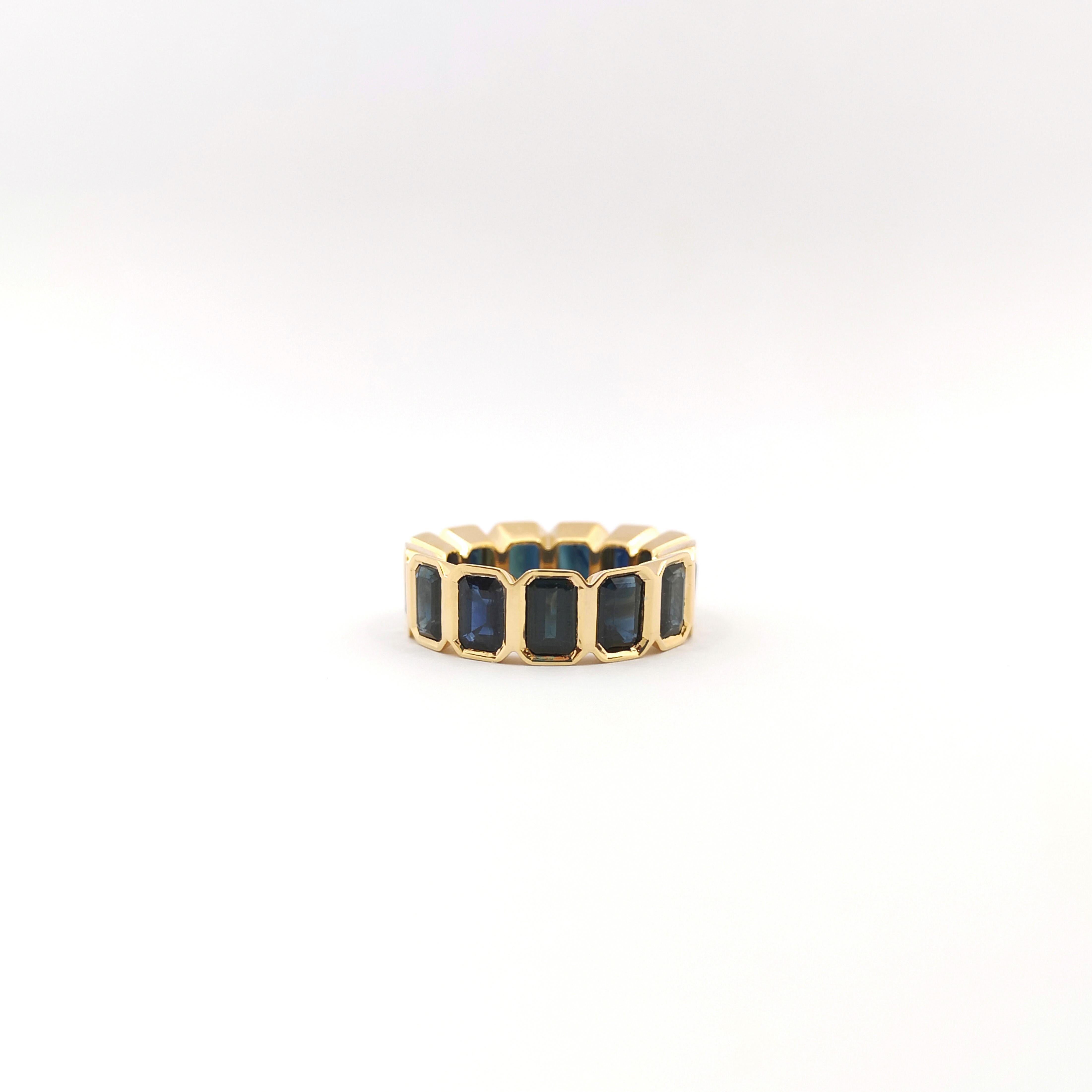 Women's or Men's Blue Sapphire Eternity Ring set in 18K Gold Settings For Sale