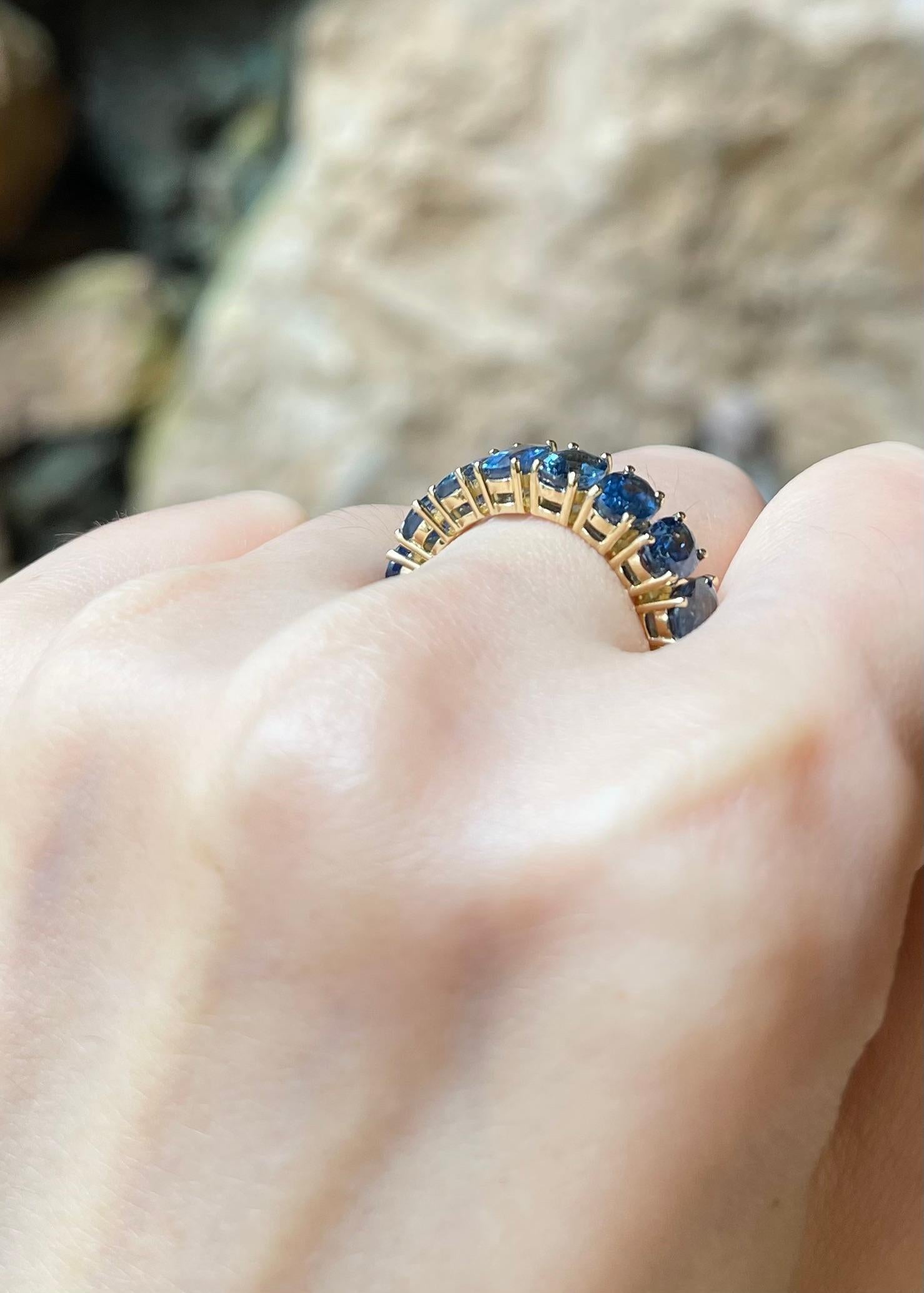 Bague d'éternité en or 18 carats sertie de saphirs bleus Pour femmes en vente