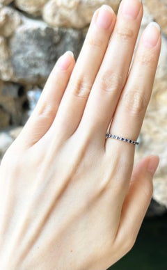 Blue Sapphire Eternity Ring set in 18K White Gold Settings