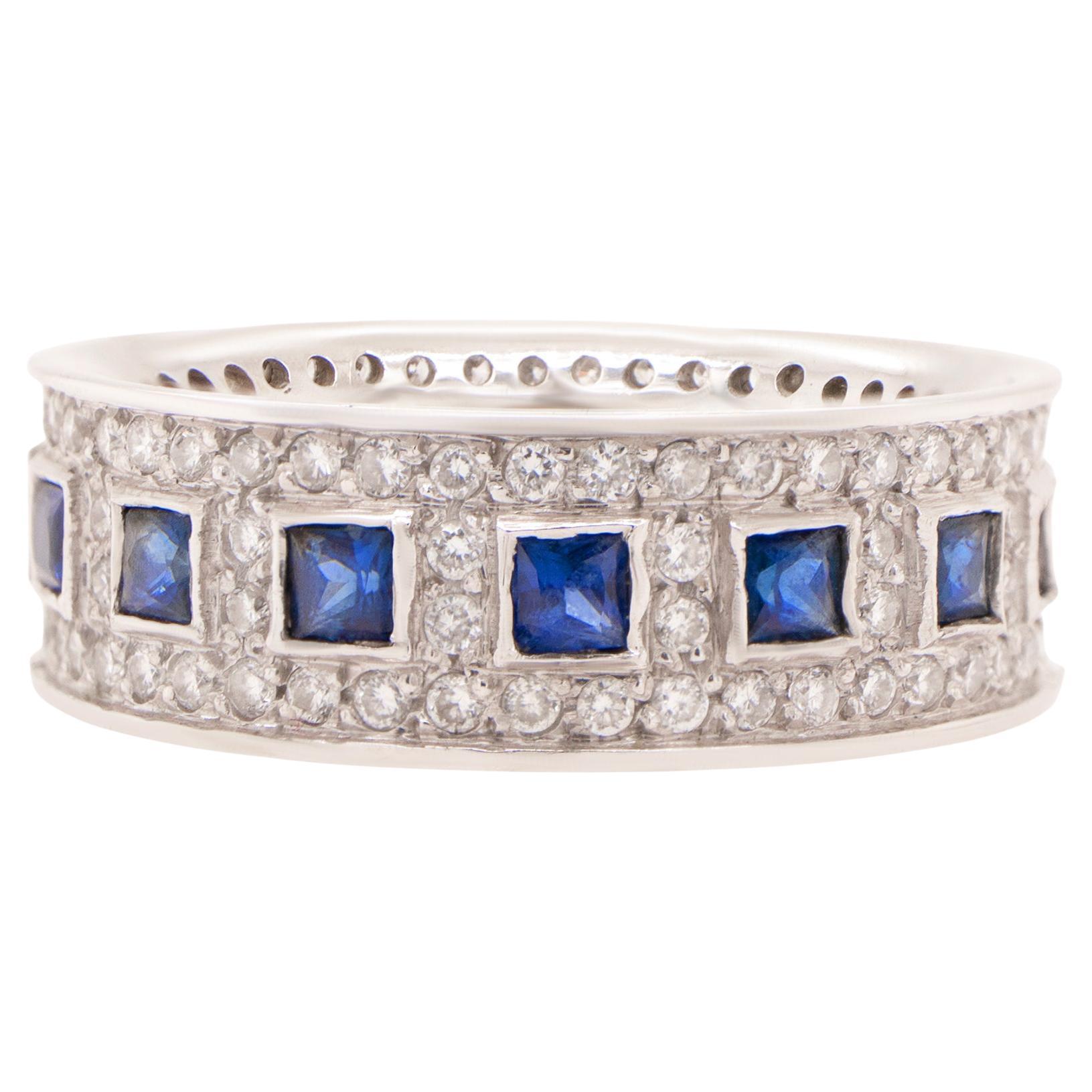 Anello Eternity con zaffiro blu e diamanti 2,2 carati totali in oro 14 carati