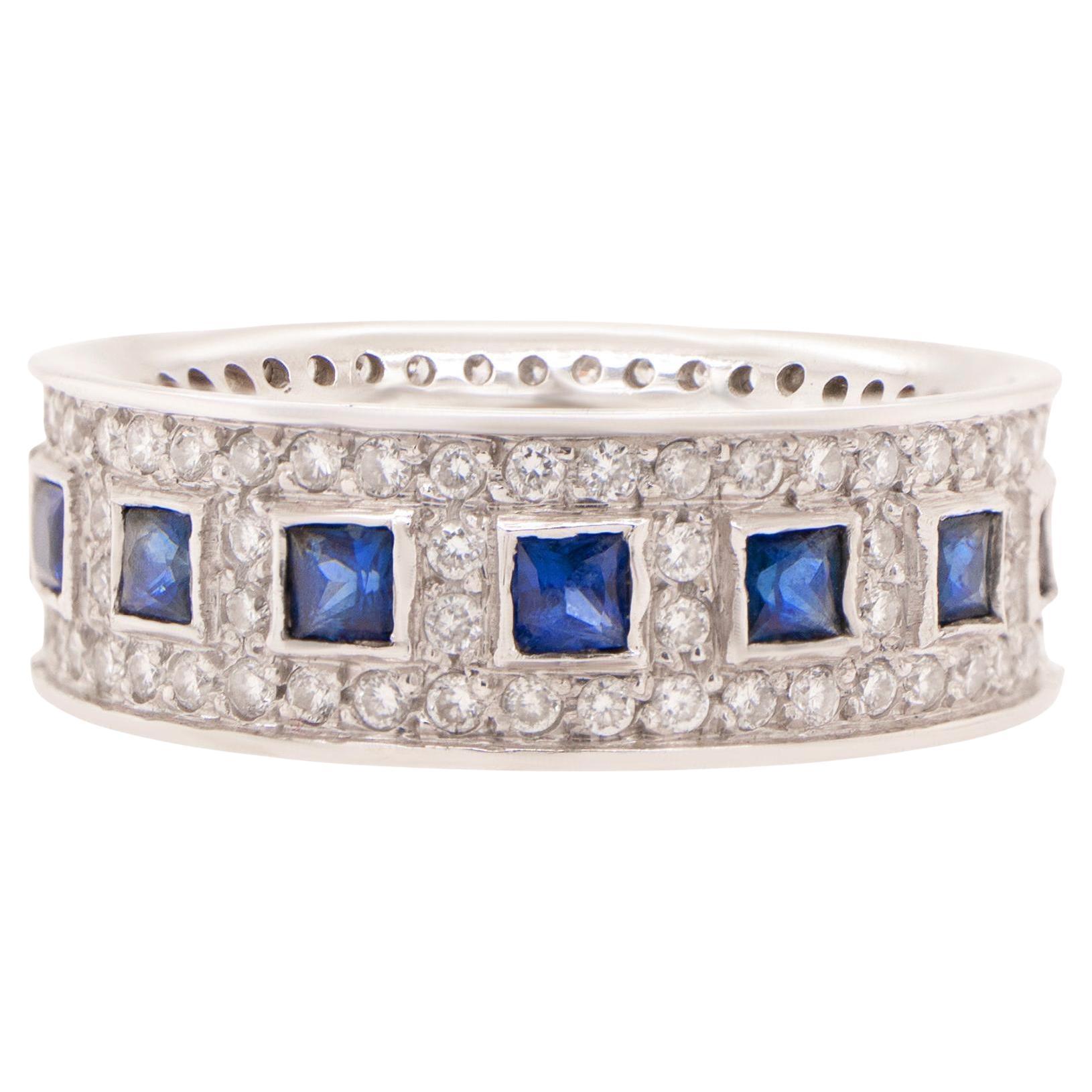 Anello Eternity con zaffiro blu e diamanti 2,2 carati totali in oro 14 carati