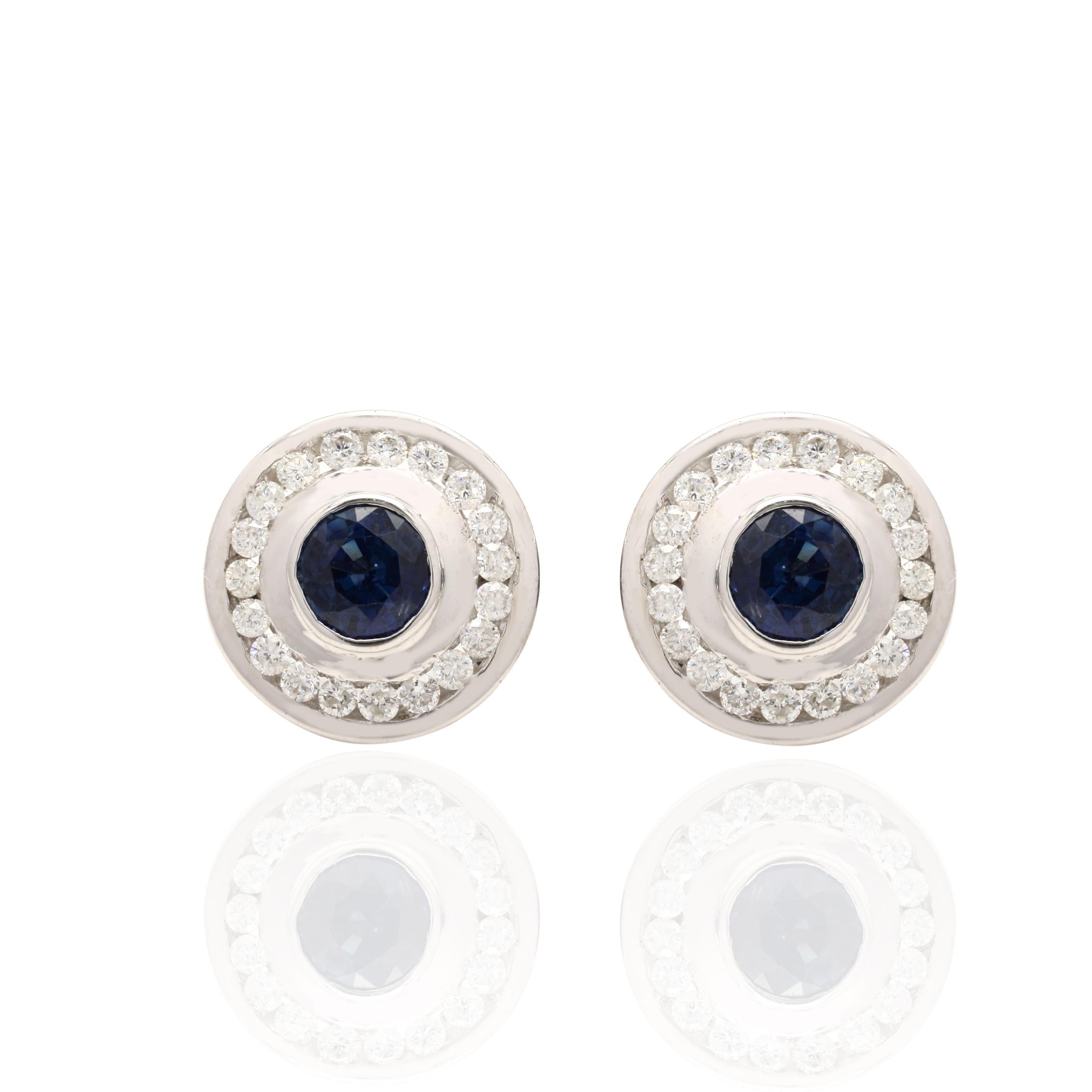 Round Cut Blue Sapphire Studs with Diamonds in 14K Gold. Embrace your look with these stunning pair of earrings suitable for any occasion to complete your outfit.
Studs create a subtle beauty while showcasing the colors of the natural precious
