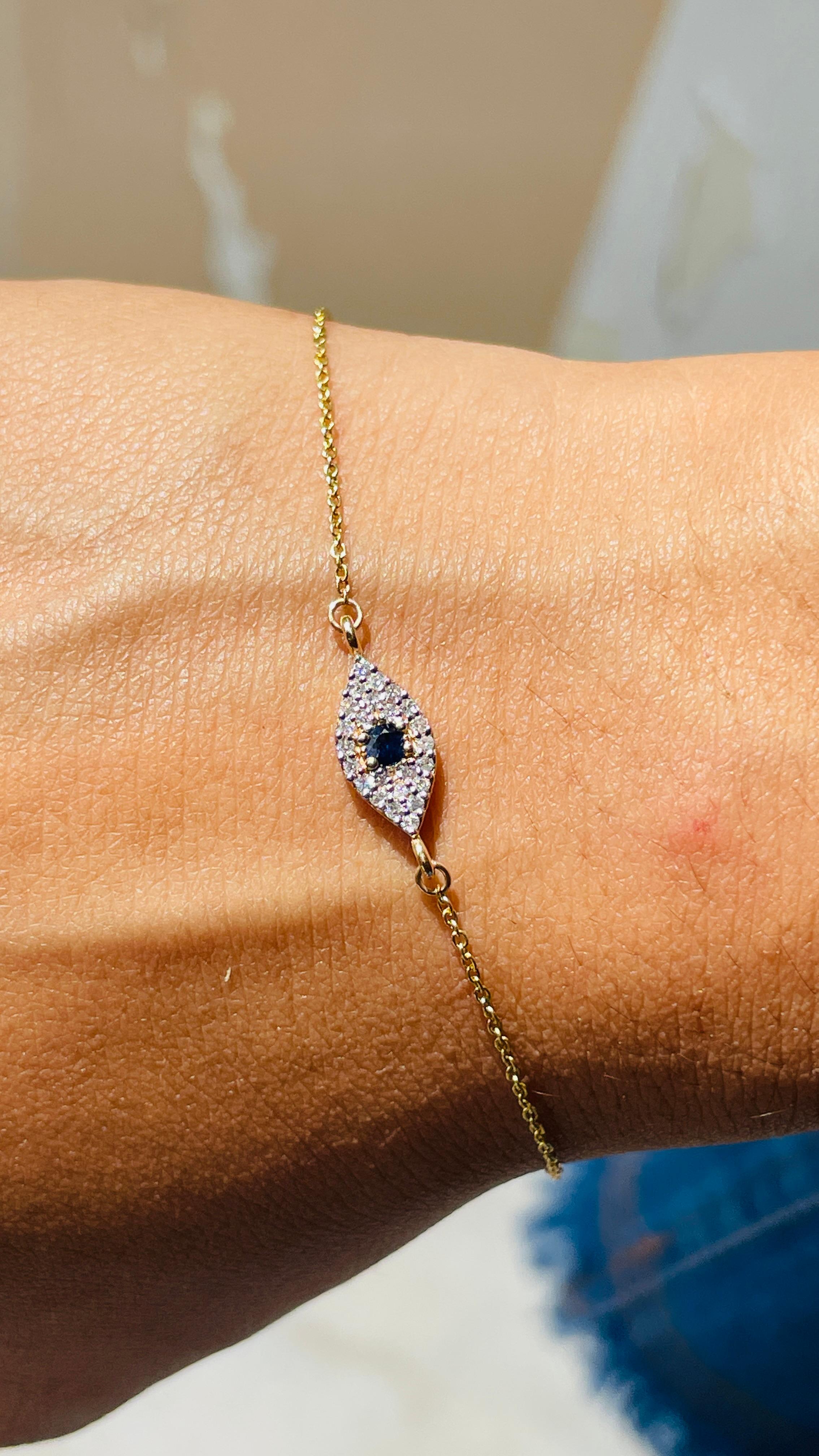Contemporary Blue Sapphire Evil Eye and Diamond Chain Bracelet in 14k Yellow Gold For Sale