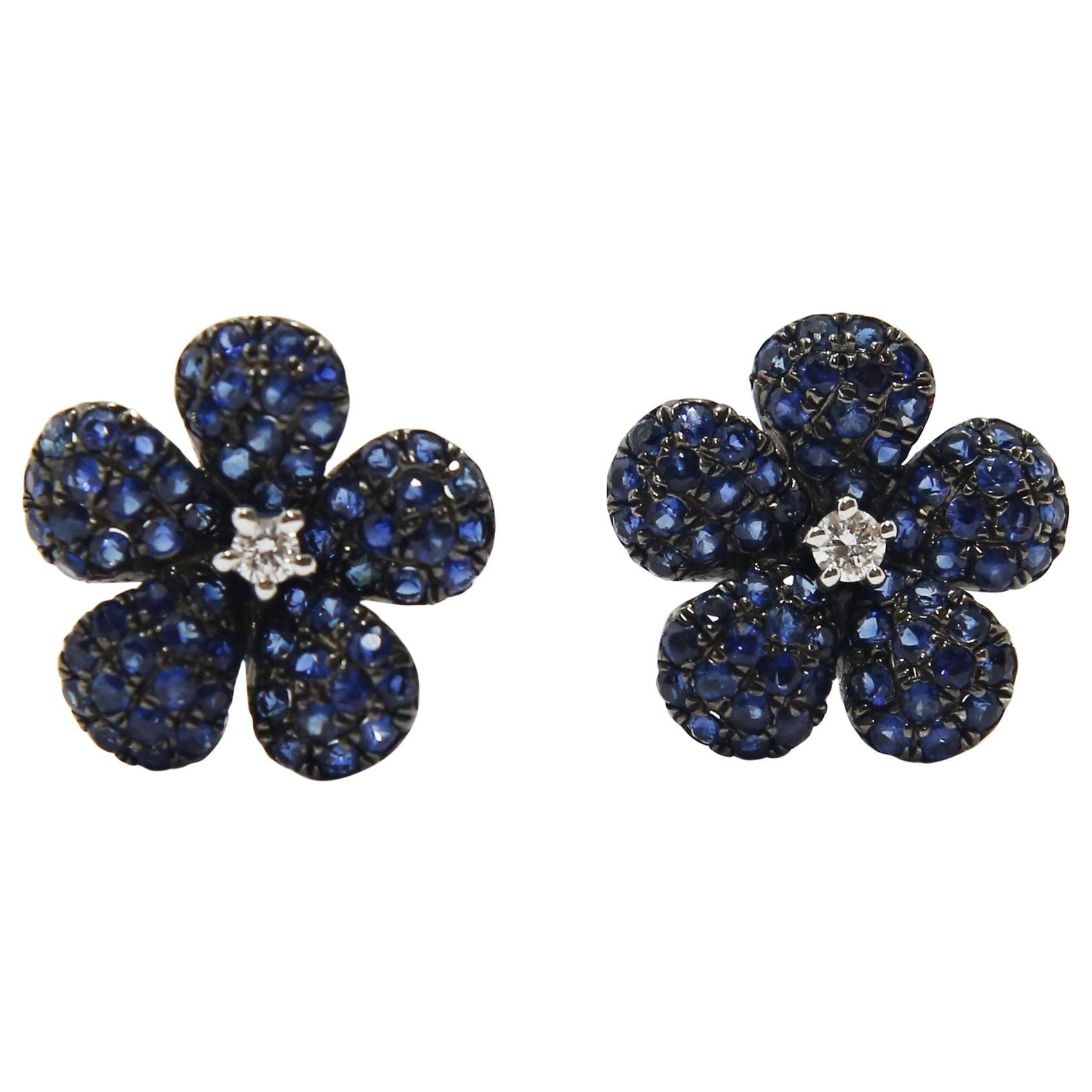 Blue Sapphire Flower Earrings in 18k White Gold center diamonds  For Sale