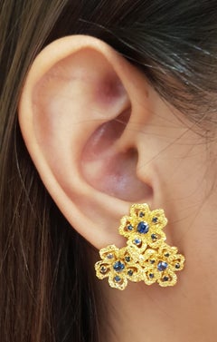 Blue Sapphire Flower Earrings set in 14 Karat Gold Settings