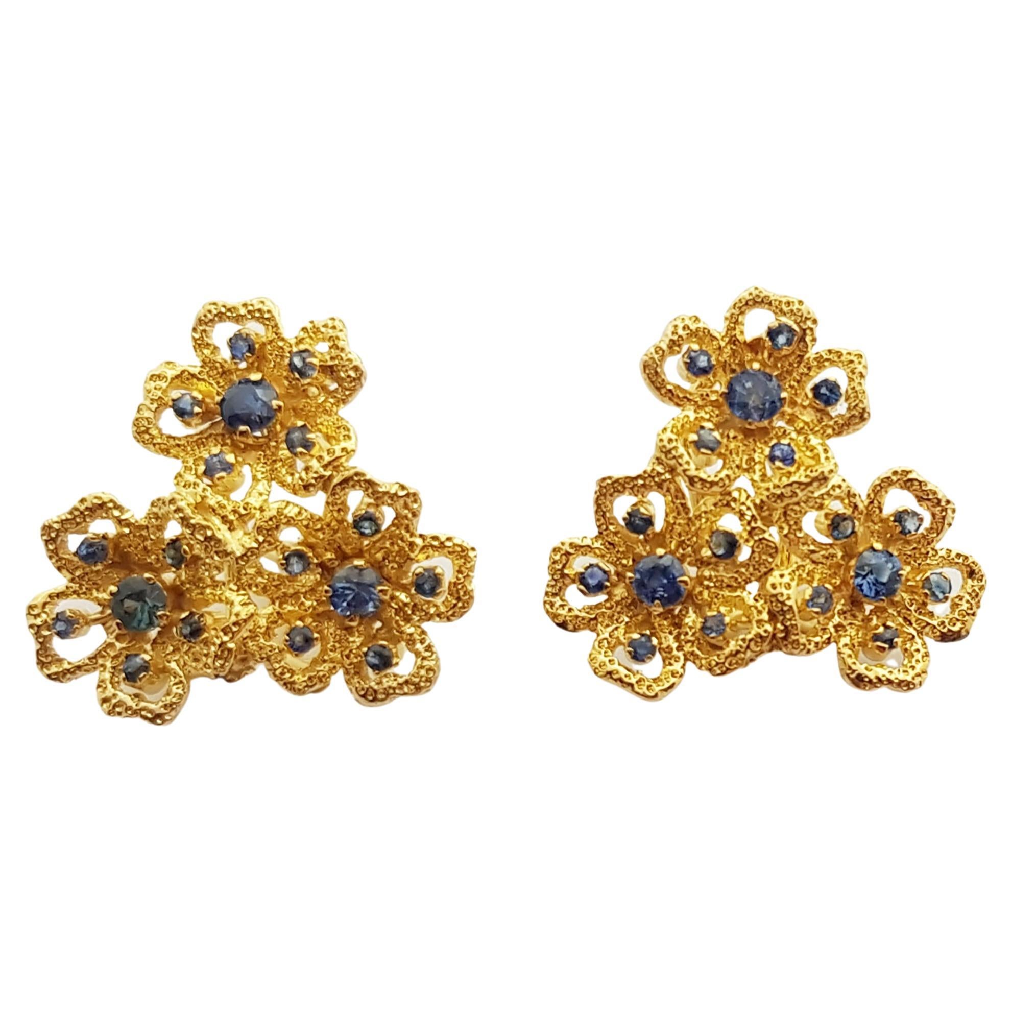 Blue Sapphire Flower Earrings set in 14 Karat Gold Settings For Sale