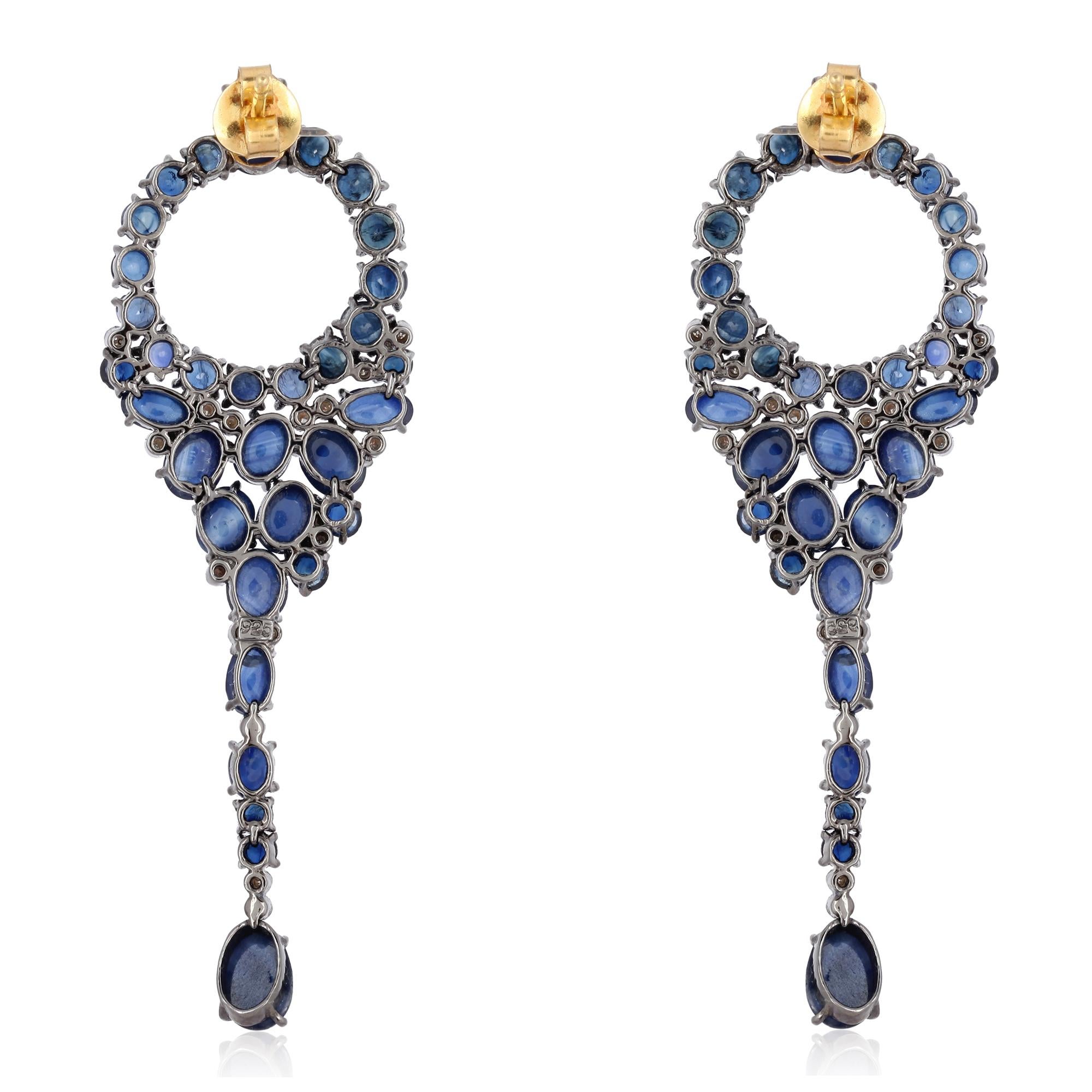 Contemporary Blue Sapphire Fluid Diamond Earrings For Sale