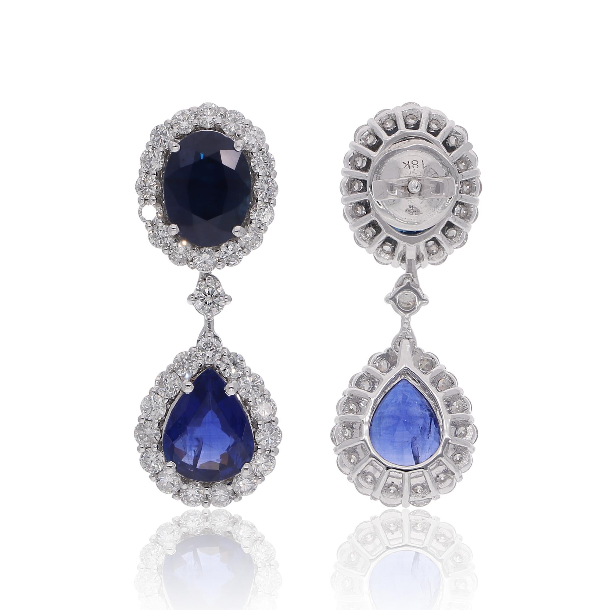Item Code :- SEE-13099
Gross Wt. :- 8.60 gm
18k White Gold Wt. :- 6.74 gm
Diamond Wt. :- 2.15 Ct. ( AVERAGE DIAMOND CLARITY SI1-SI2 & COLOR H-I )
Blue Sapphire Wt. :- 7.13 Ct.
Earrings Length :- 31 mm approx.

✦ Sizing
.....................
We can