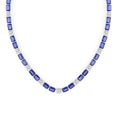 Collier en or blanc 18 carats avec saphir bleu et diamant SI/H