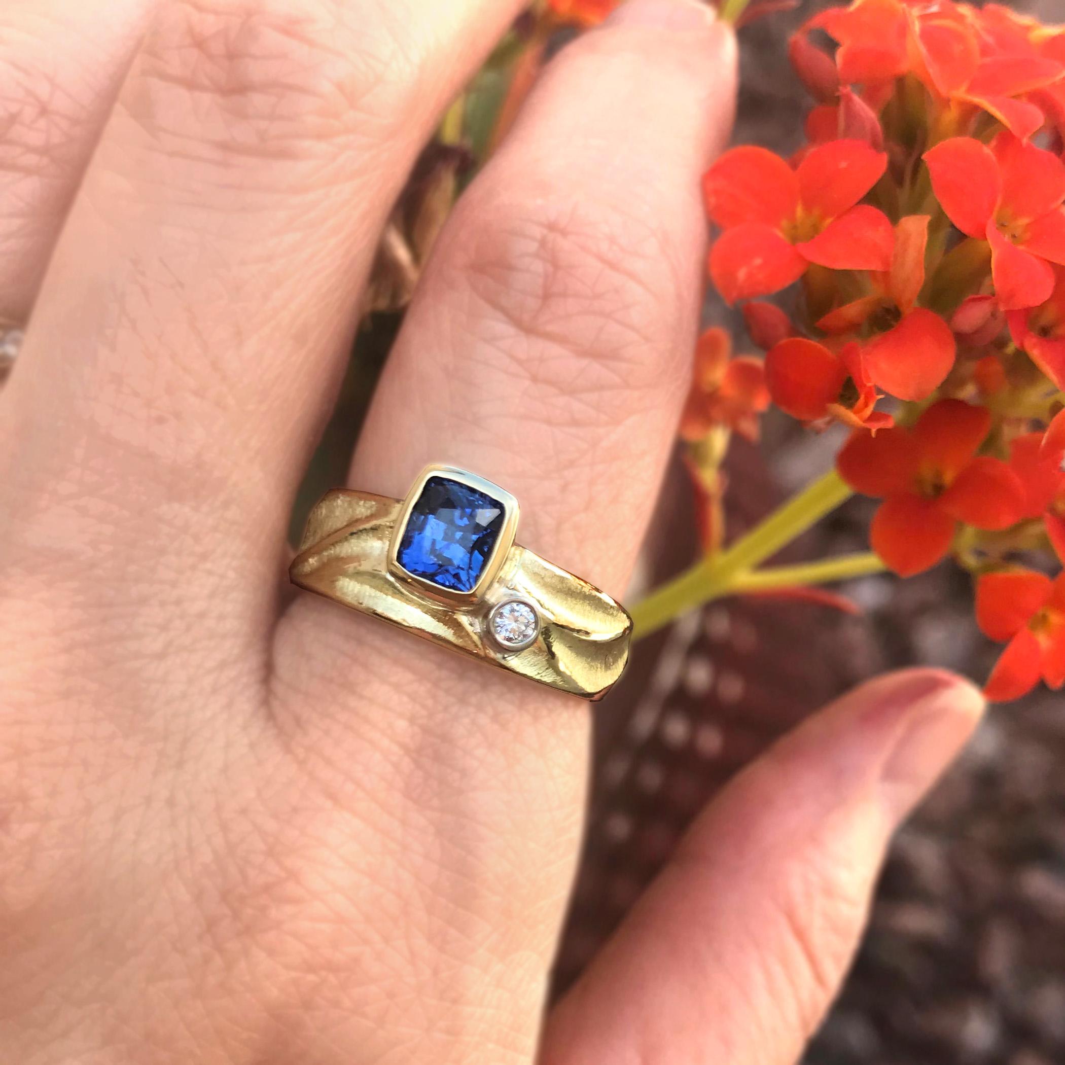 K.Mita's 1.17ct Blue Sapphire Geo Ring is made from 18K Yellow Gold with a 0.04ct side Diamond set in 18K Palladium White Gold. Sapphire is the birthstone for September and the second hardest mineral next to diamonds, making it a great selection for