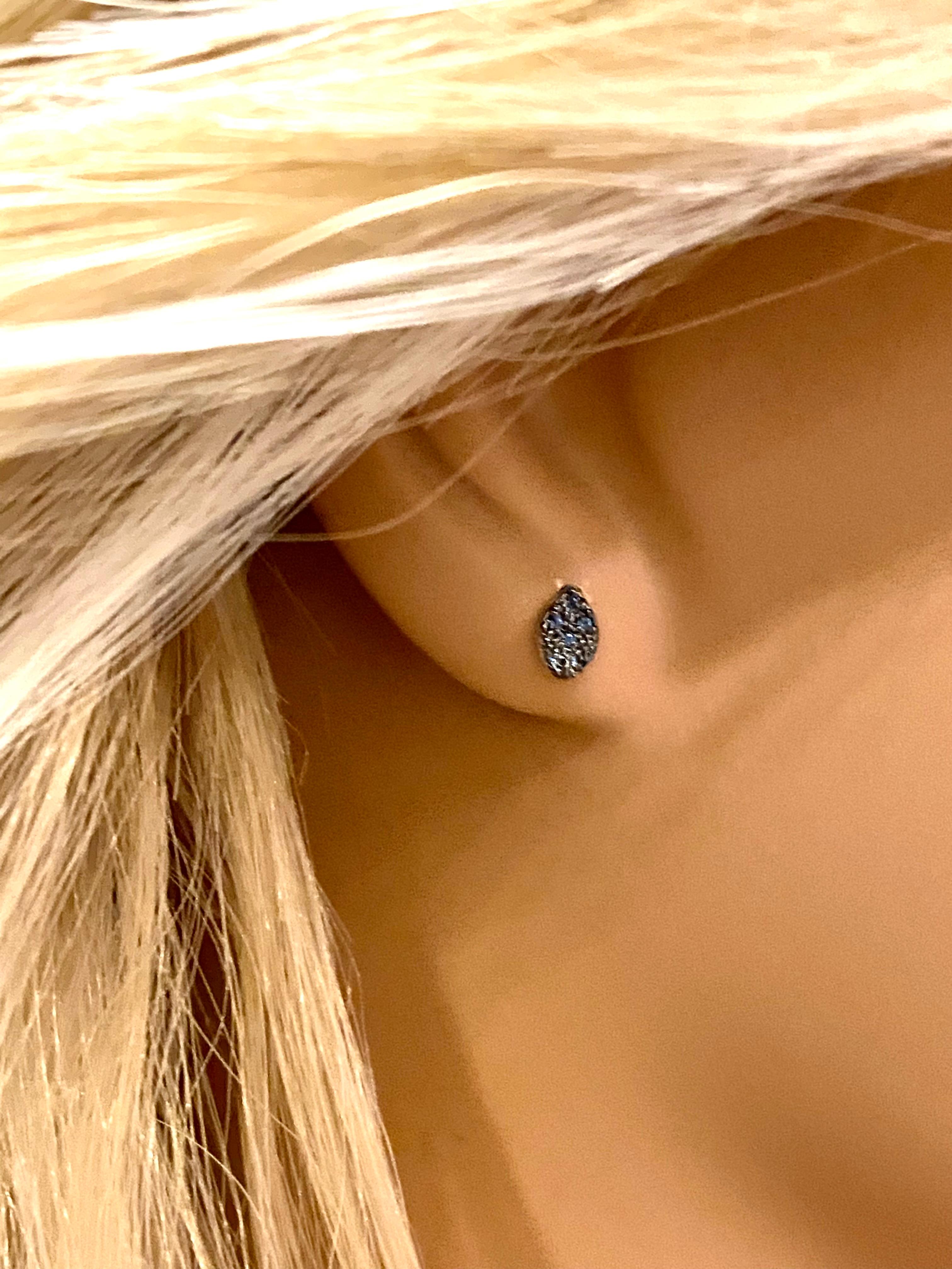 14 karat white gold tiny blacken sapphire stud earrings
Pear shape studs measuring 0.25 inch
Round sapphire weighing 0.25 carat 
Black rhodium plated 
New Earrings
Handmade in the USA
