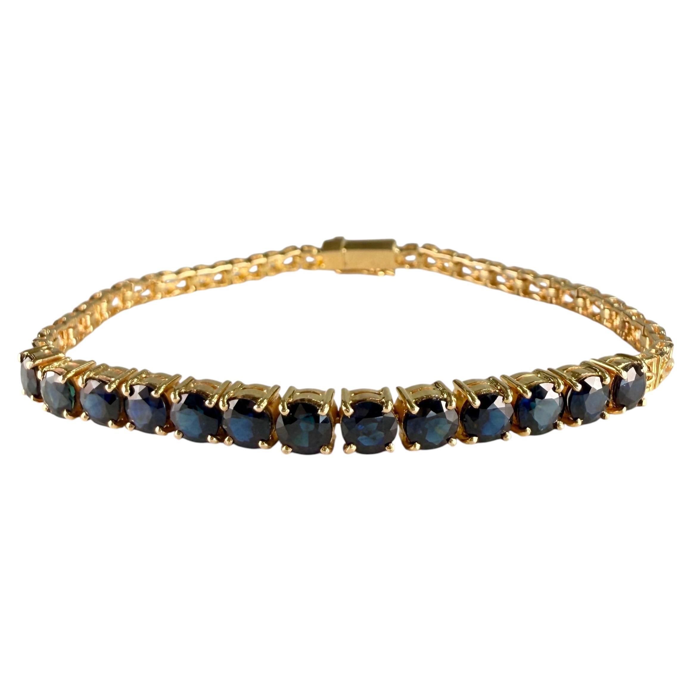 Media pulsera de zafiro azul de oro amarillo de 14k