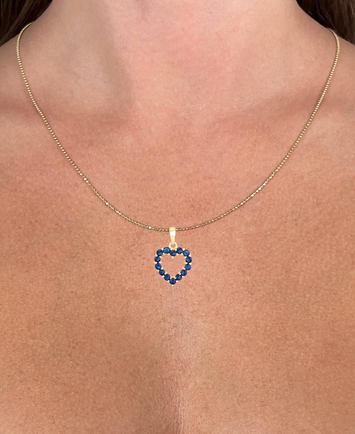 Contemporary Blue Sapphire Heart Pendant Necklace 10K Yellow Gold For Sale