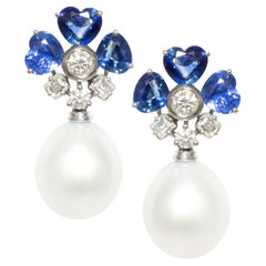Ohrringe in Herzform mit blauem Saphir und Diamant-Perlen  Design von Ella Gafter