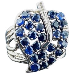 Blue Sapphire Leaf Ring with Diamonds in 14 Karat White Gold