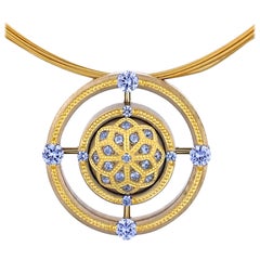 Blue Sapphire Mandala Pendant in Bronze and 24 Karat Gold