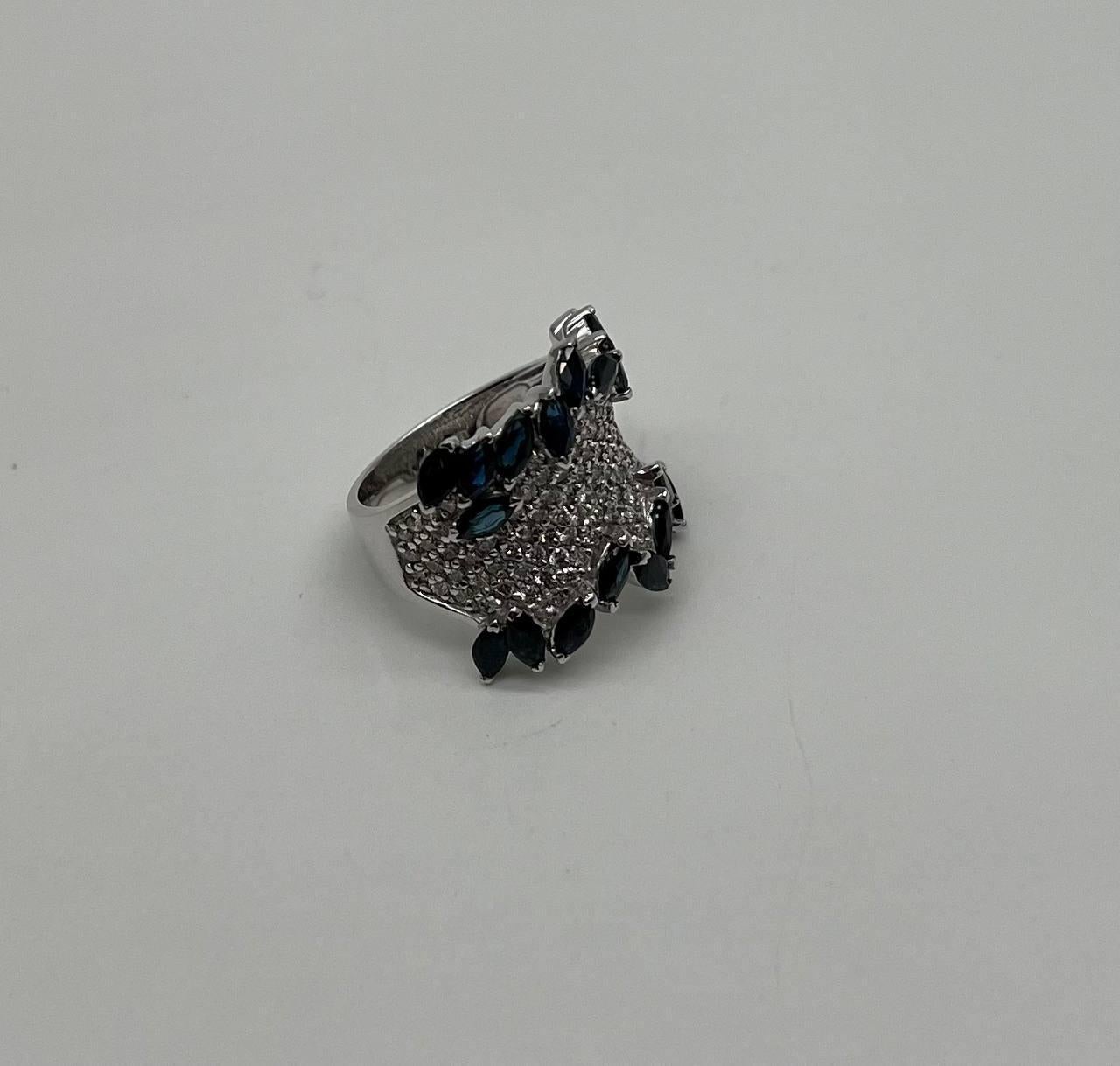 Modern Blue Sapphire Marquise Shape Diamond Pave Set 14K White Gold Statement Band Ring For Sale