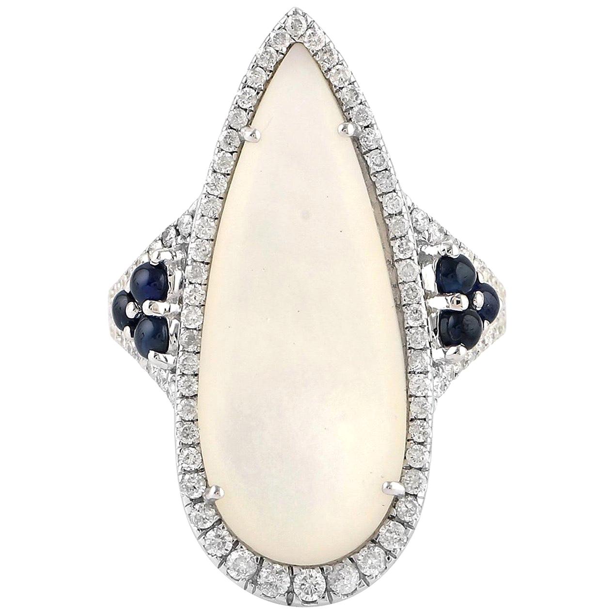 For Sale:  Blue Sapphire Mother of Pearl 18 Karat Gold Diamond Ring