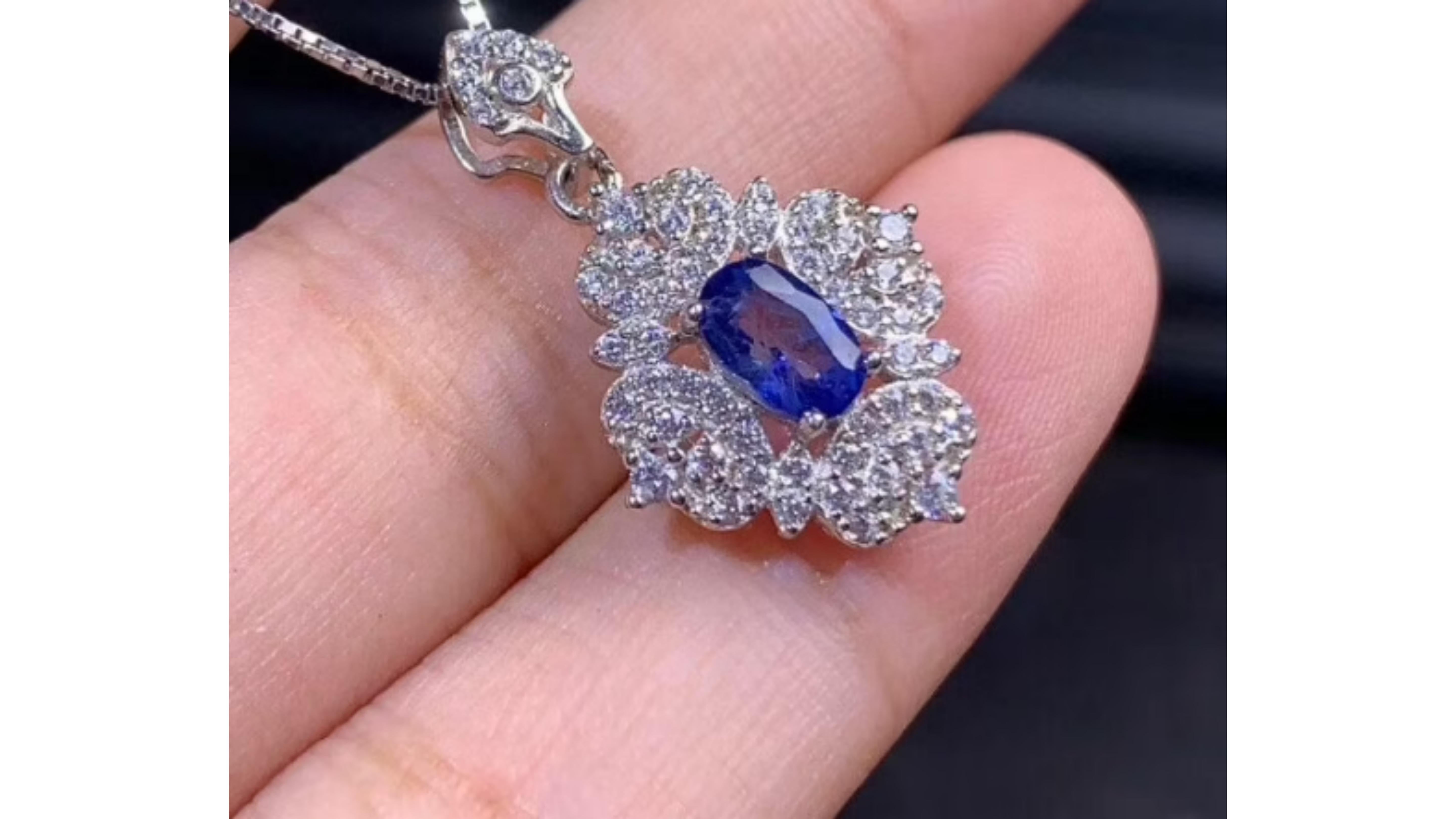 Blue  Oval Sapphire Necklace with accent stones stands out in the platinum plated metal too.

In ancient Greece and Rome, kings and queens were convinced that blue sapphires protected their owners from envy and harm. ... During the Middle Ages, the