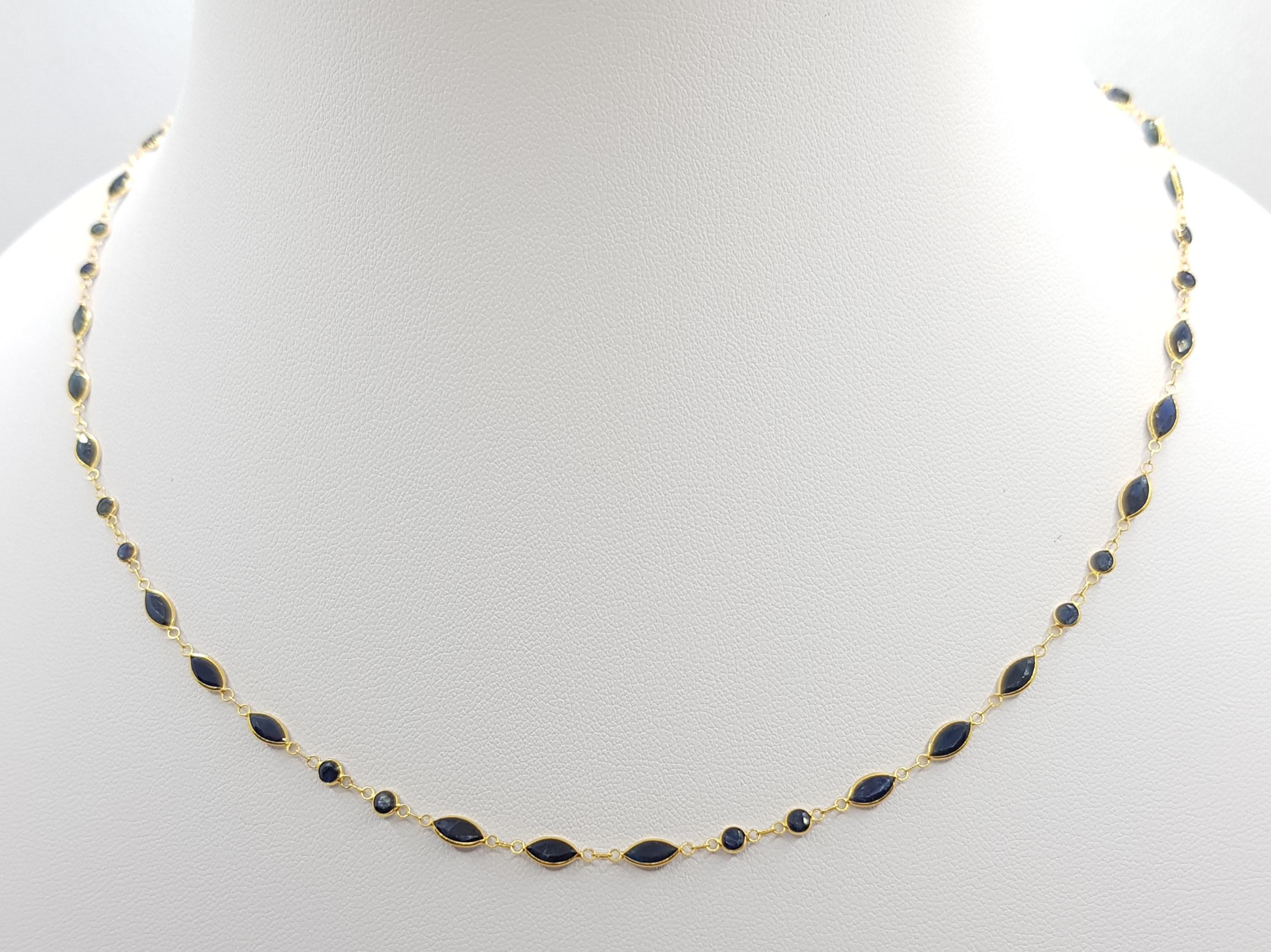 Collier de saphirs bleus de 9,73 carats sertis en or 18 carats

Largeur :  0.3 cm 
Longueur : 47,5 cm
Poids total : 3,68 grammes

