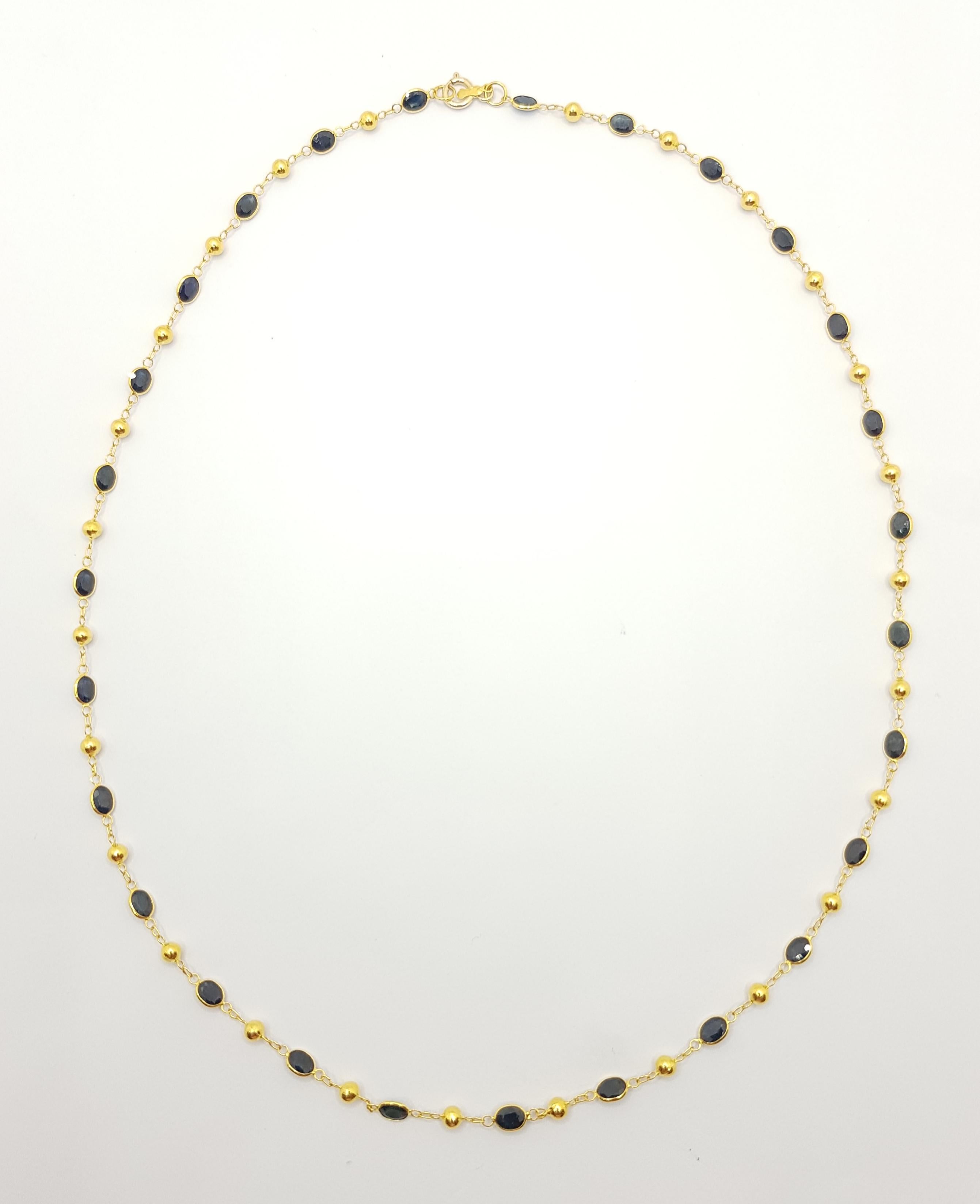 Contemporary Blue Sapphire Necklace Set in 18 Karat Gold Settings For Sale