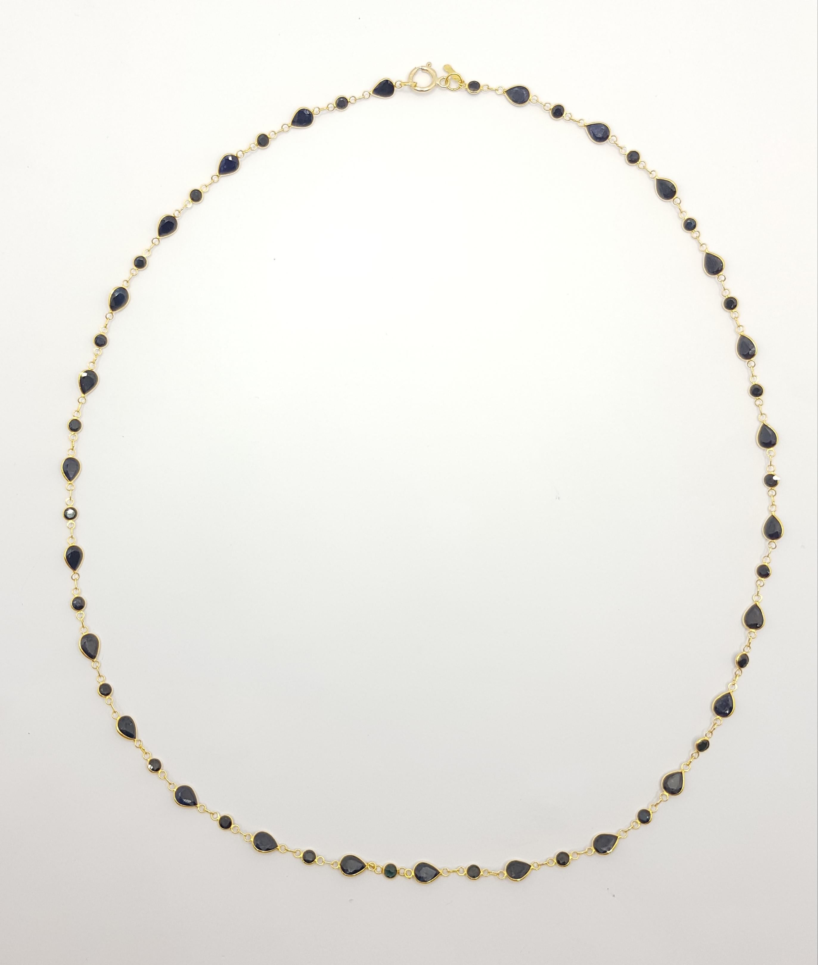 Mixed Cut Blue Sapphire Necklace Set in 18 Karat Gold Settings For Sale