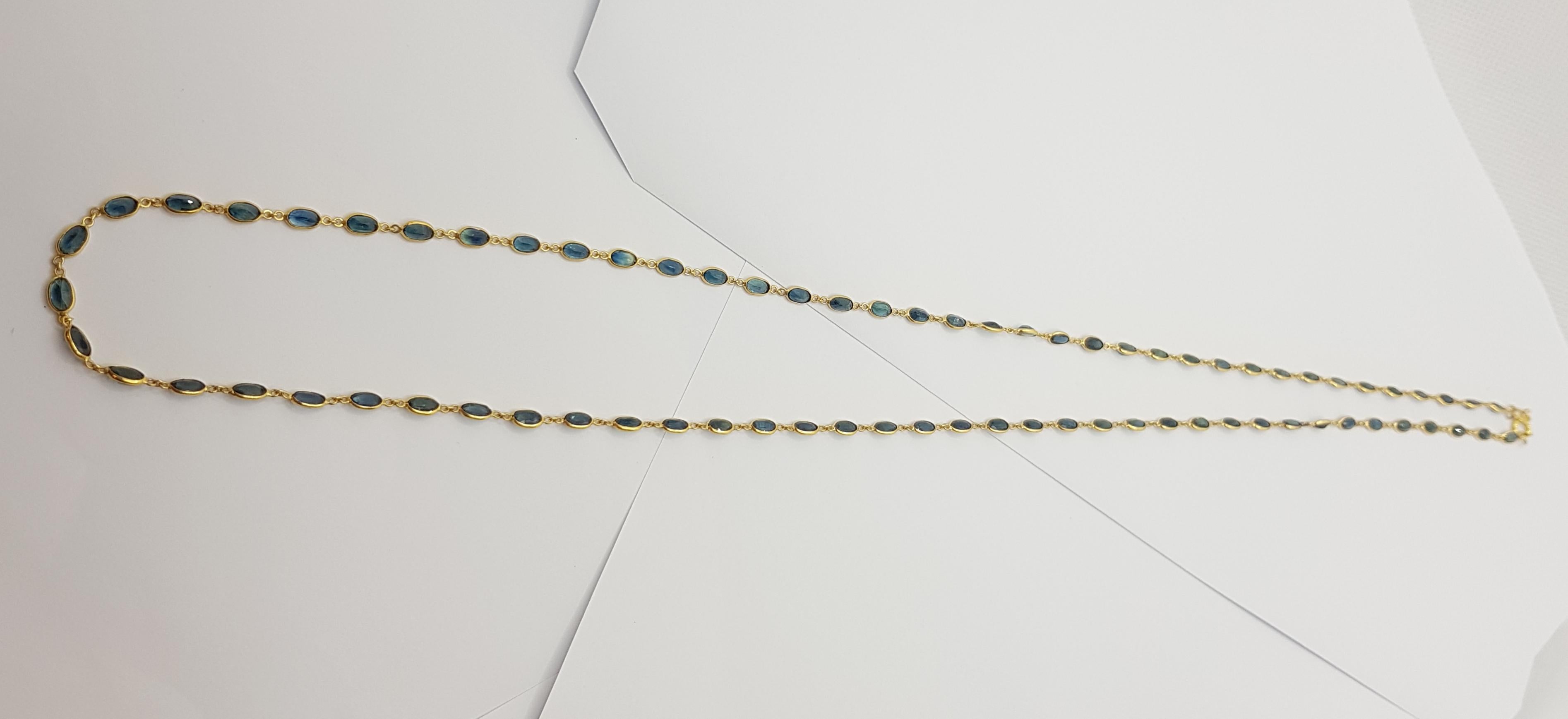 Women's Blue Sapphire Necklace Set in 18 Karat Gold Settings For Sale