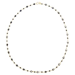 Collana di zaffiri blu con montatura in oro 18 carati