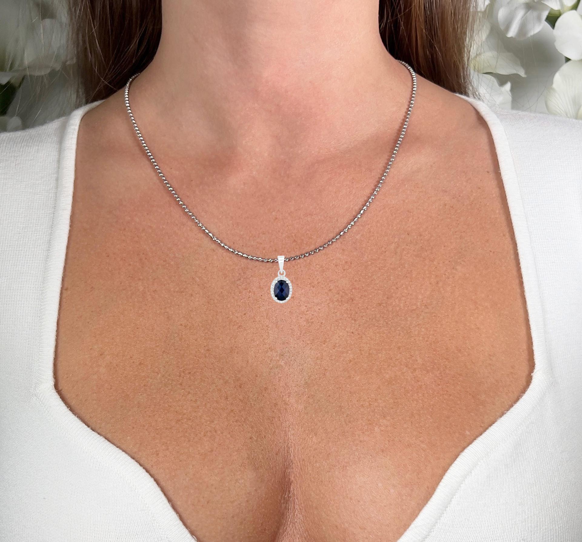 It comes with the Gemological Appraisal by GIA GG/AJP
All Gemstones are Natural
Oval Blue Sapphire = 1.58 Carat
24 Round Diamonds = 0.08 Carats
Metal: 14K White Gold
Pendant Dimensions: 18 x 9 mm
