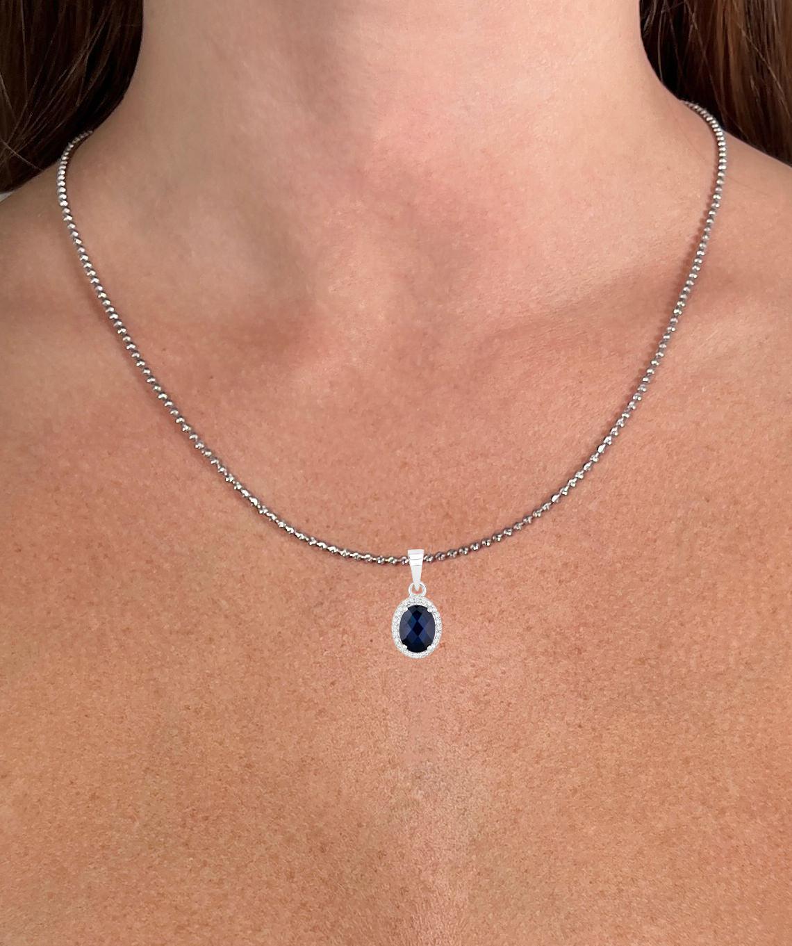 Contemporary Blue Sapphire Necklace With Diamond Halo 1.66 Carats 14K White Gold For Sale