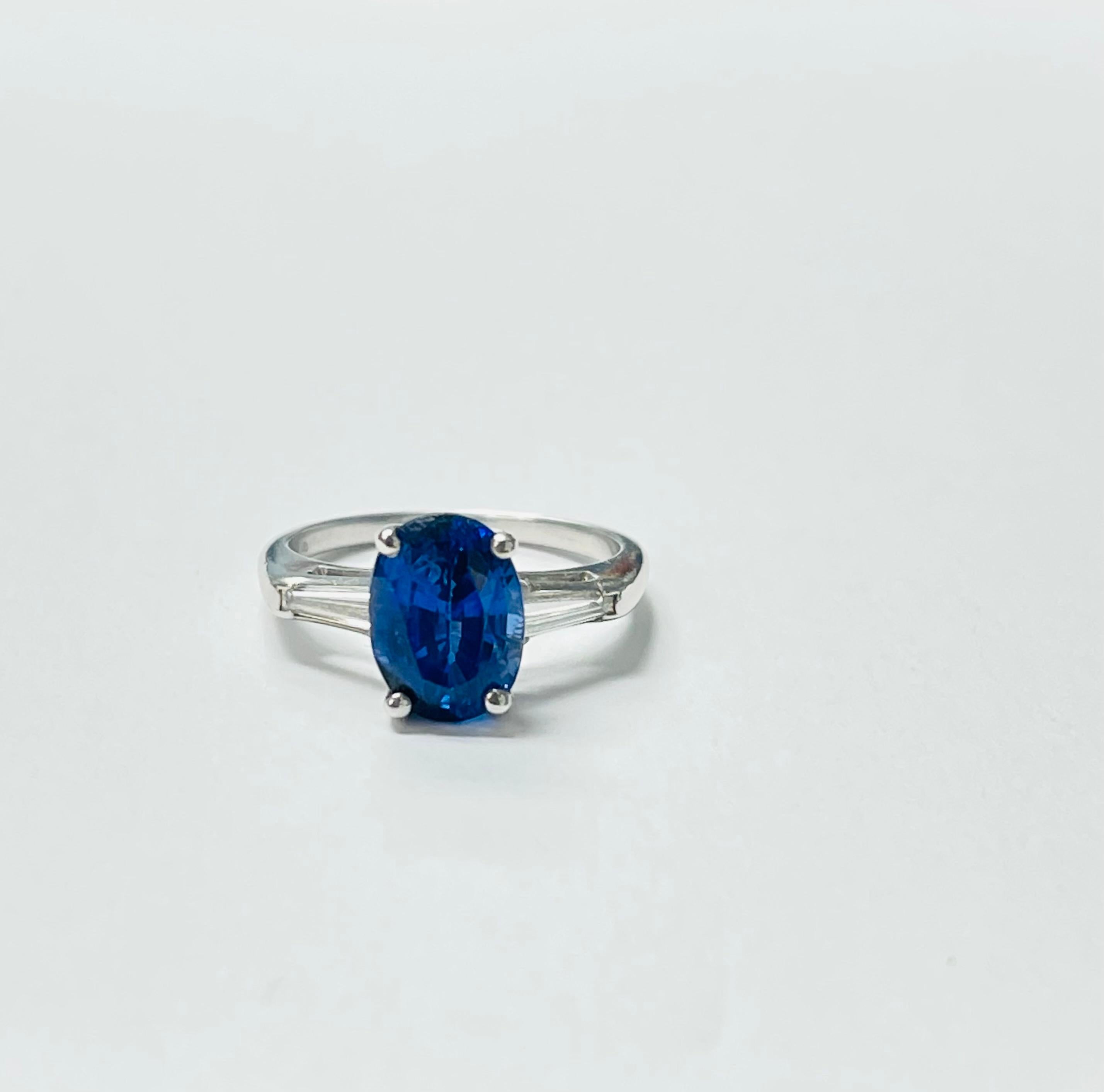 Gorgeous Royal blue sapphire and diamond engagement ring hand crafted in platinum. 
The details are as follows : 
Blue sapphire weight : 3.75 carats 
Diamond weight : 0.25 carats 
Metal : Platinum 
