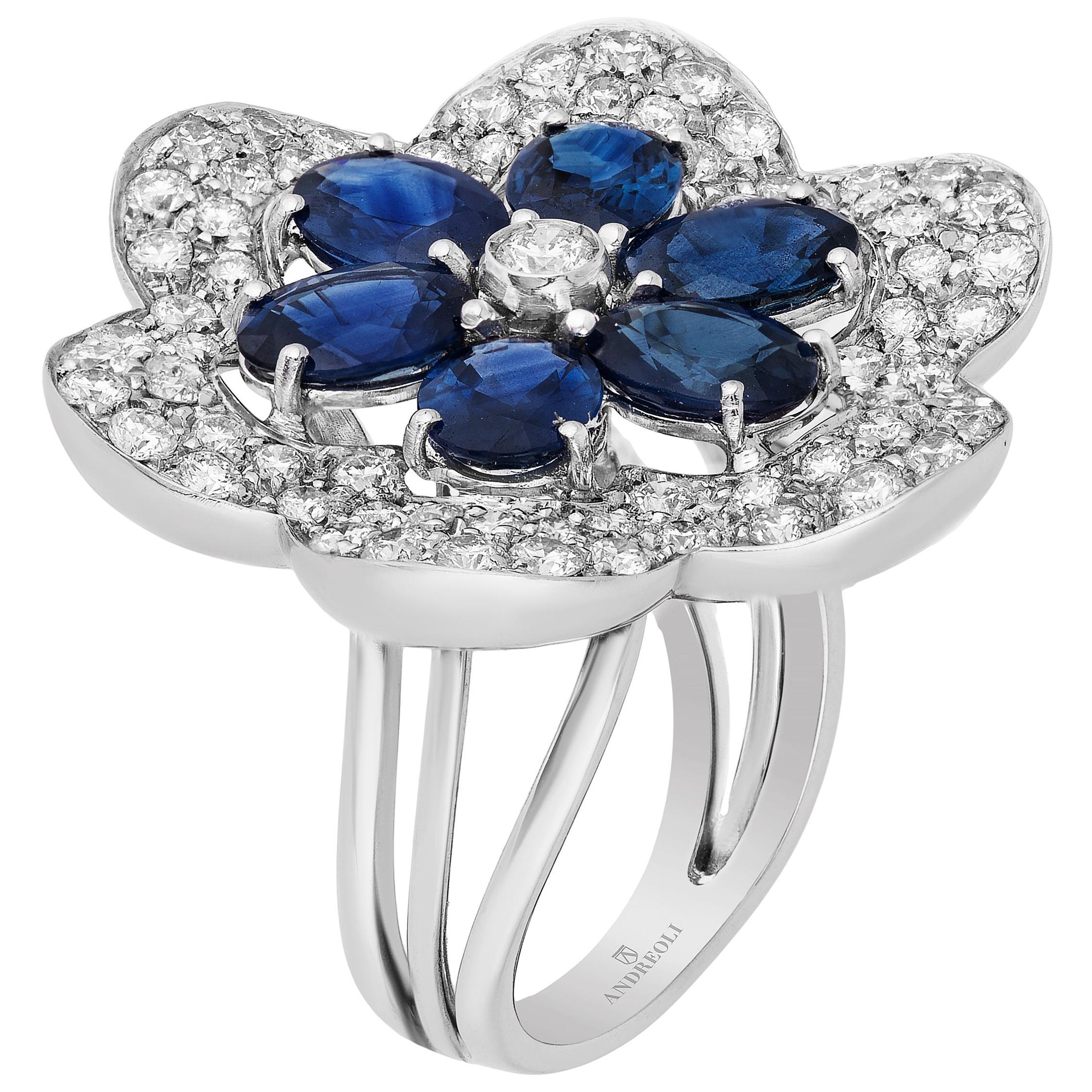 Blue Sapphire Oval and Diamond Flower Cocktail Ring in 18 Karat White Gold