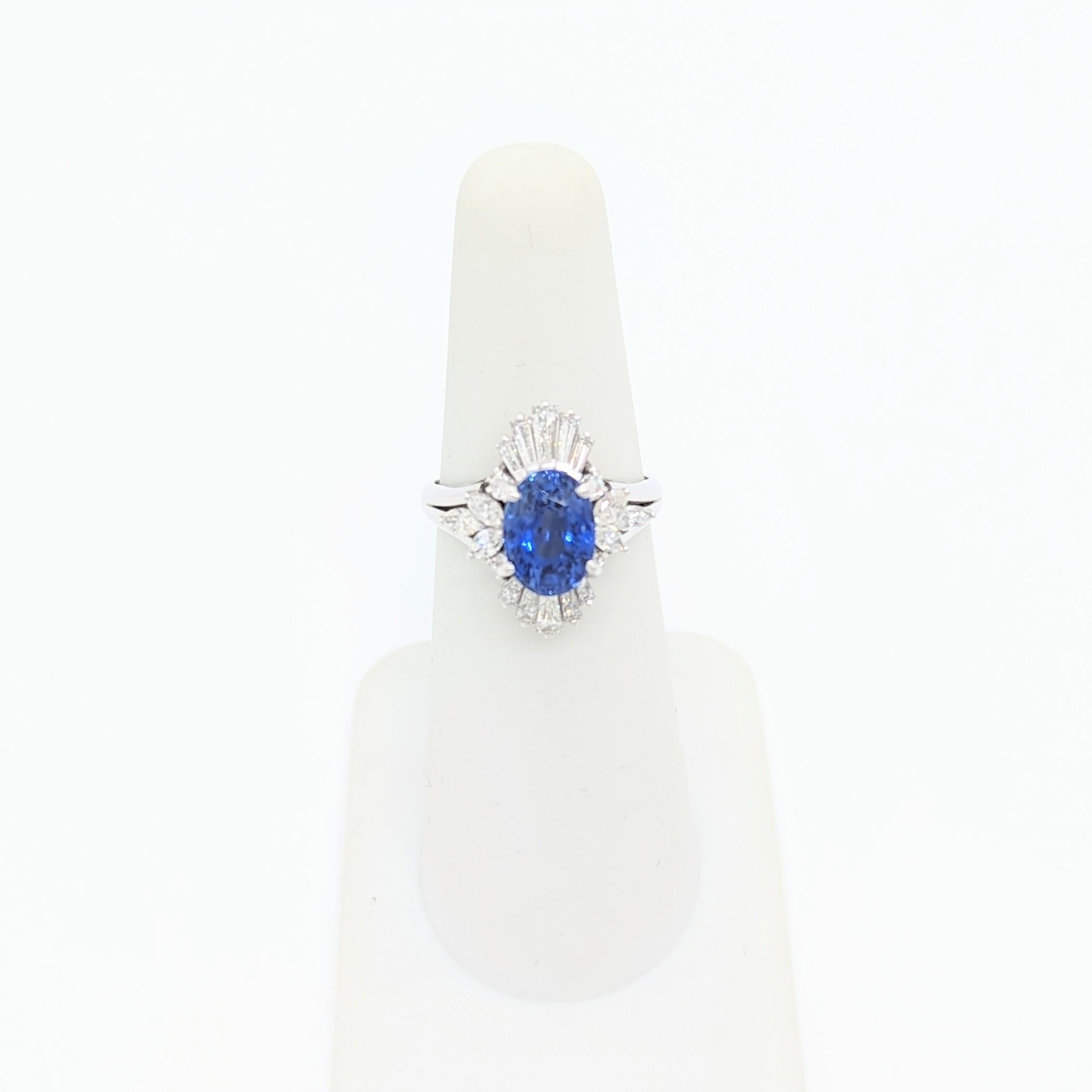 Blue Sapphire Oval and White Diamond Cluster Ring in Platinum In New Condition In Los Angeles, CA