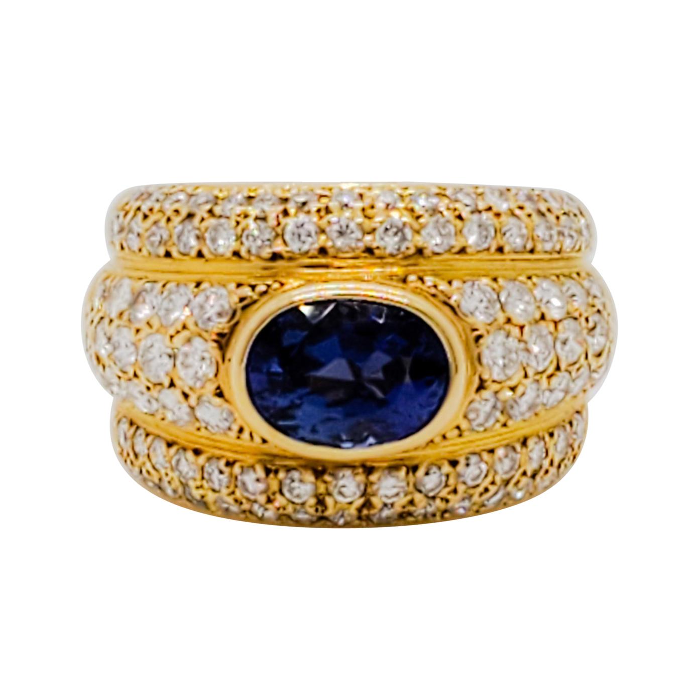 Blue Sapphire Oval and White Diamond Cocktail Ring in 18 Karat Yellow Gold For Sale