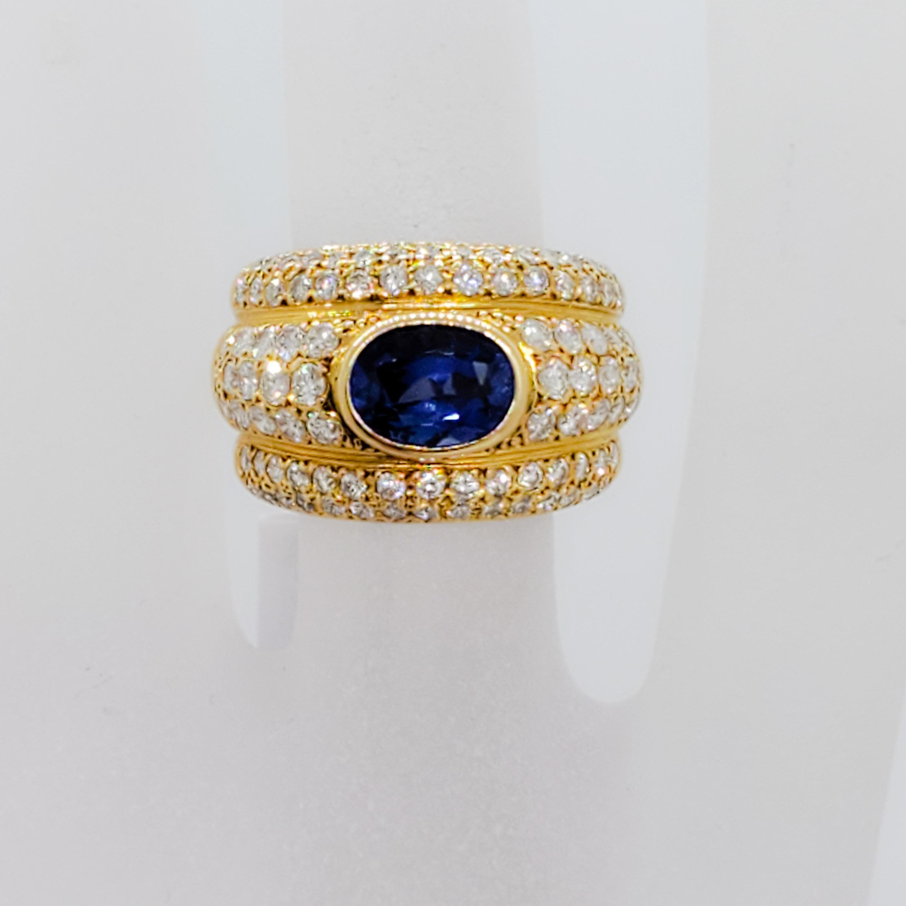 Oval Cut Blue Sapphire Oval and White Diamond Cocktail Ring in 18 Karat Yellow Gold For Sale