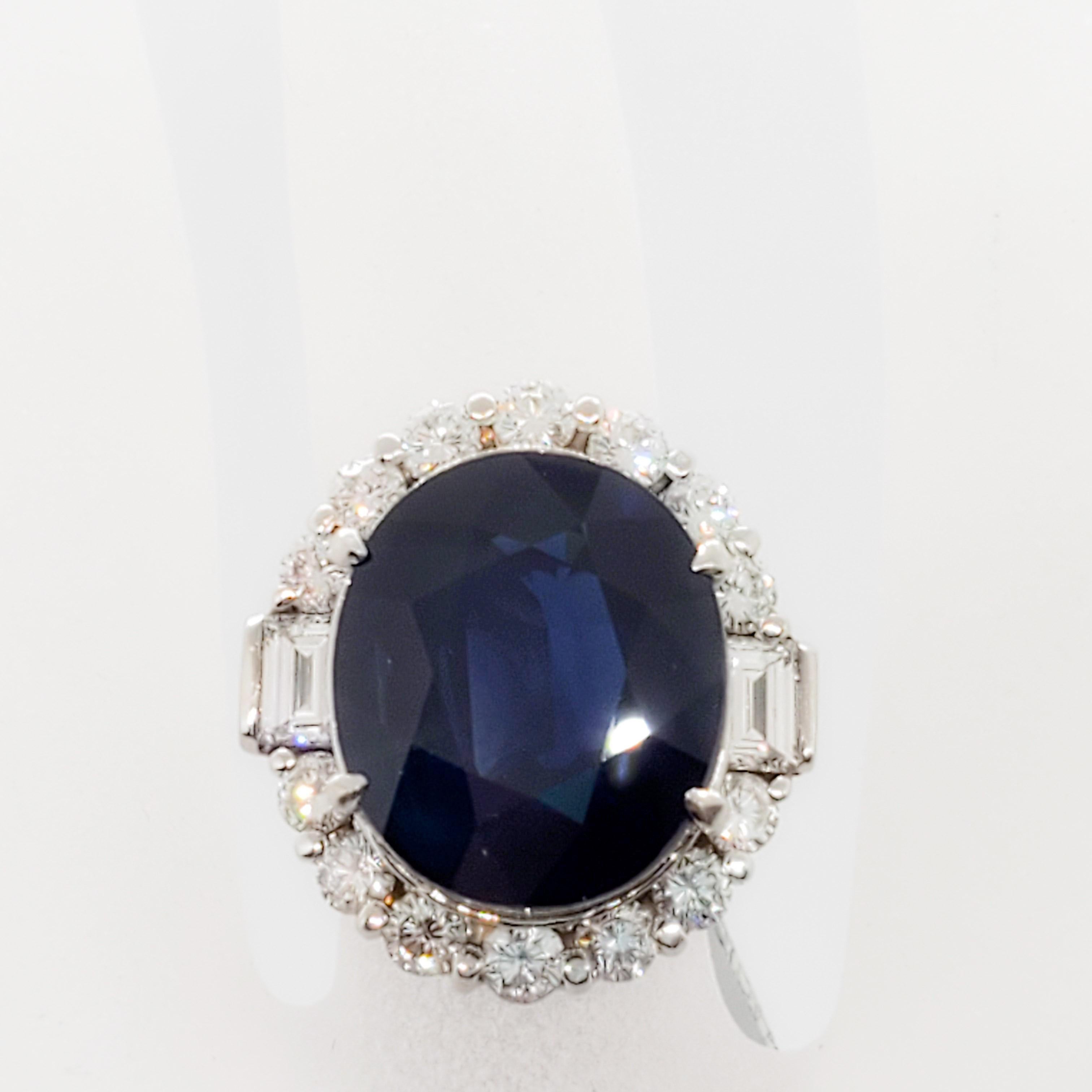 Beyond stunning blue sapphire oval weighing 15.47 cts with a deep bright blue crystal. Surrounded by 1.91 cts of good quality diamonds. Handmade platinum moutning in size 6.25. This ring is a jewelry lover's dream!