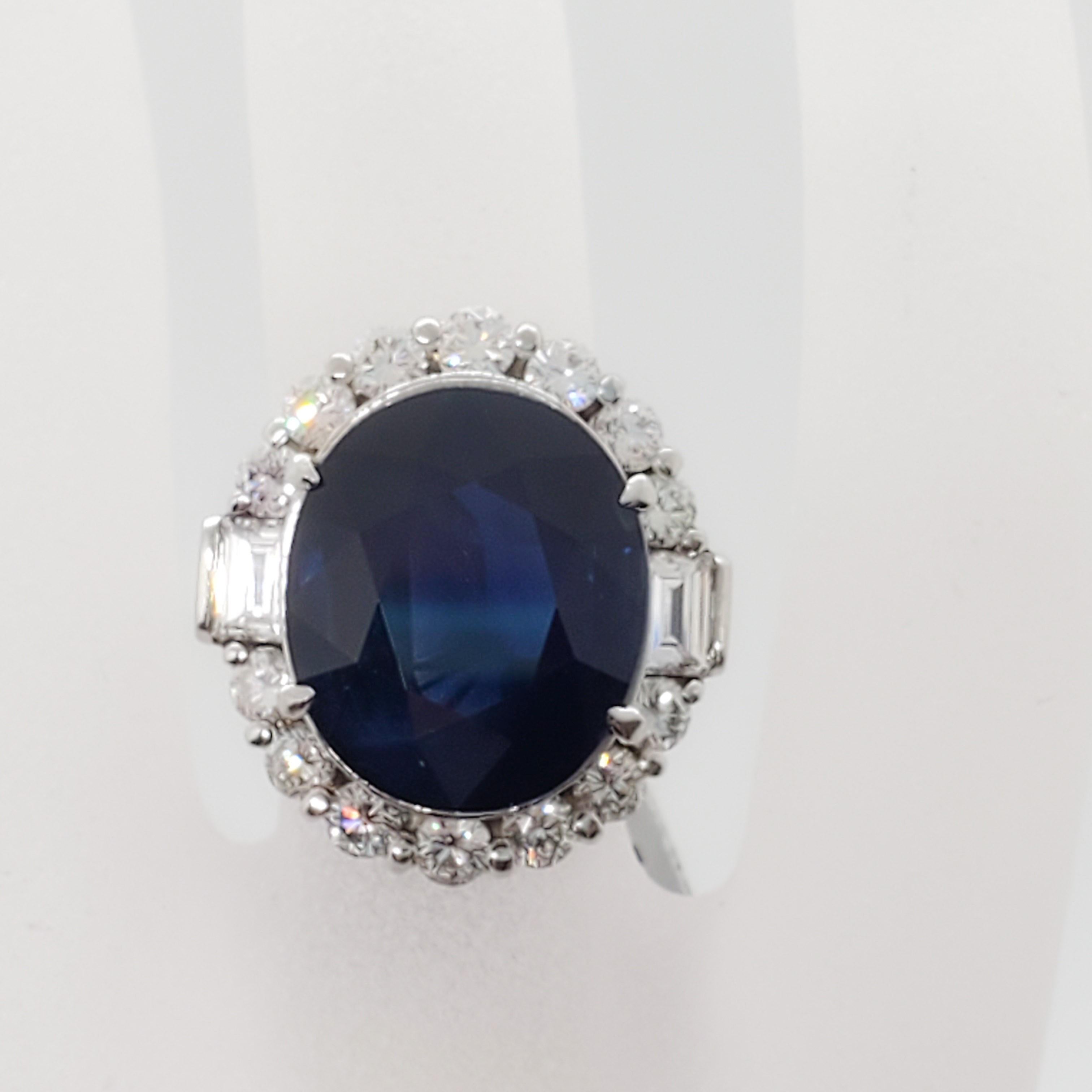 Oval Cut Blue Sapphire Oval and White Diamond Cocktail Ring in Platinum