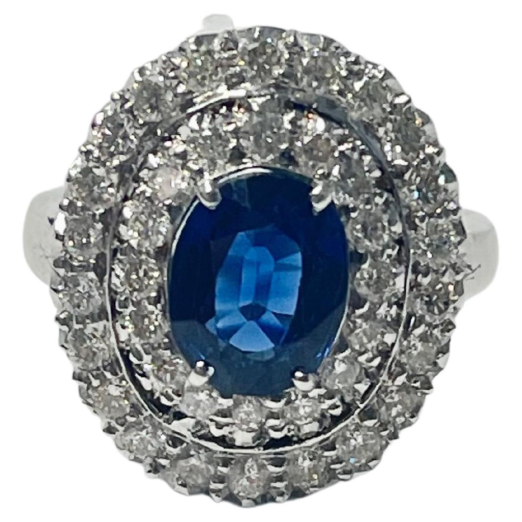Oval Cut Blue Sapphire Oval and White Diamond Engagement Ring In 18K White Gold.  For Sale