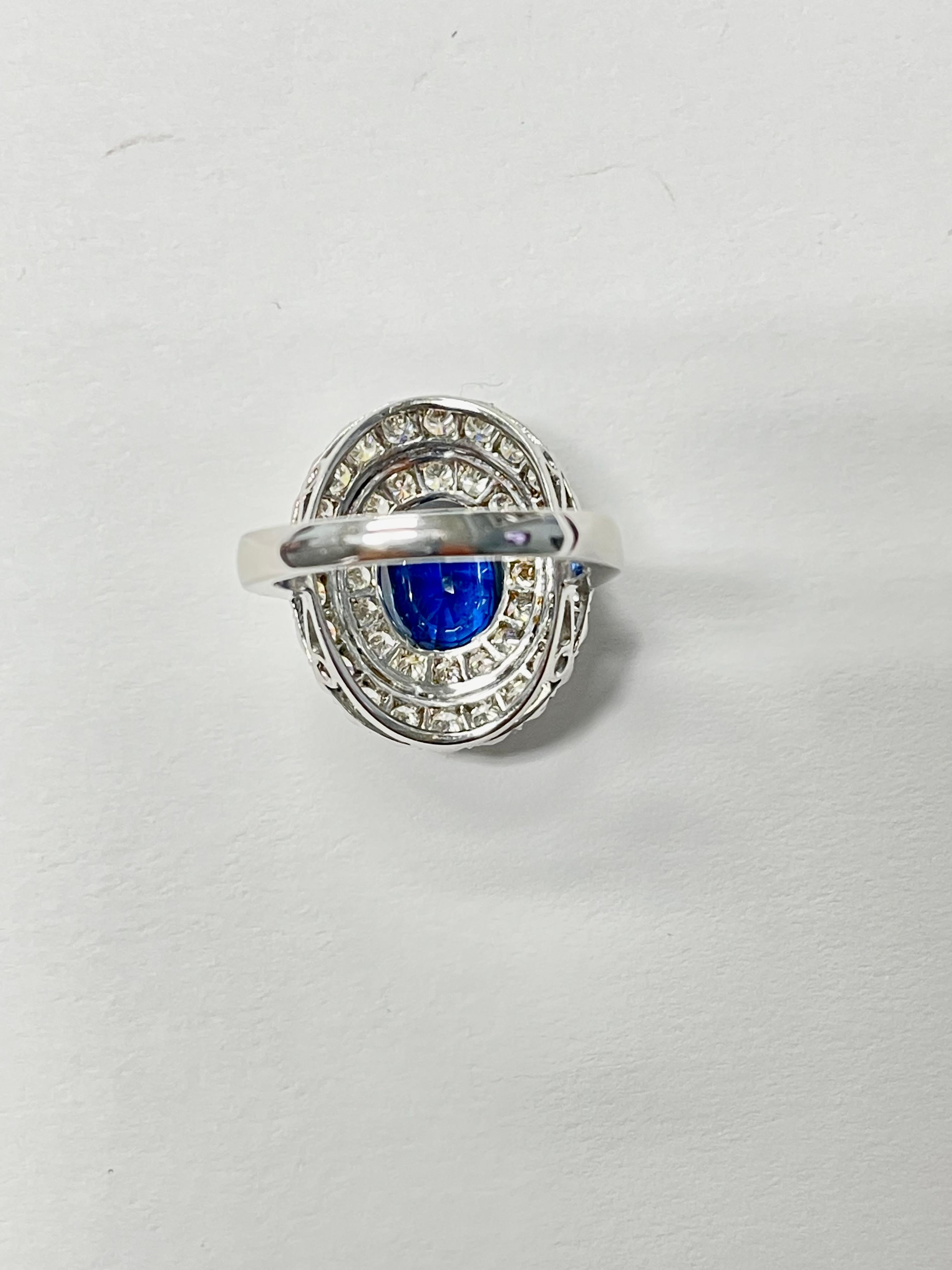 Women's or Men's Blue Sapphire Oval and White Diamond Engagement Ring In 18K White Gold.  For Sale