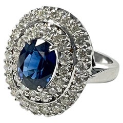 Antique Blue Sapphire Oval and White Diamond Engagement Ring In 18K White Gold. 