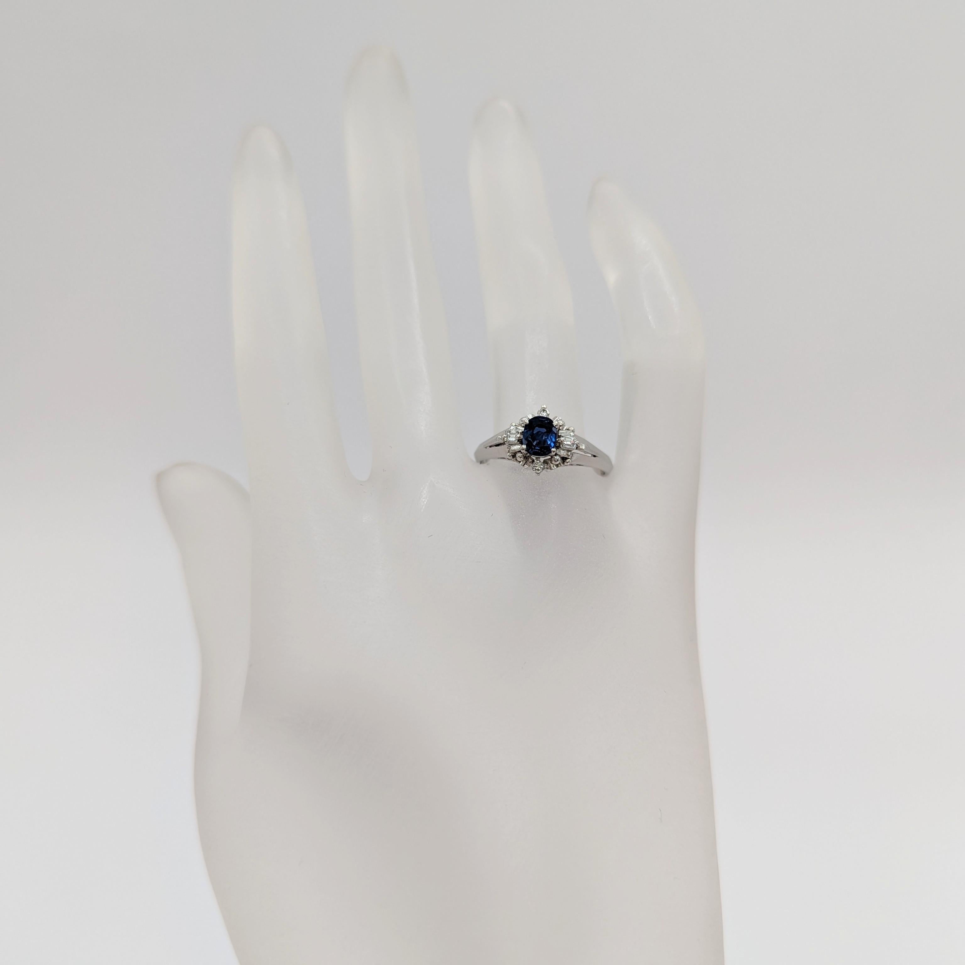 Oval Cut Blue Sapphire Oval and White Diamond Ring in Platinum For Sale