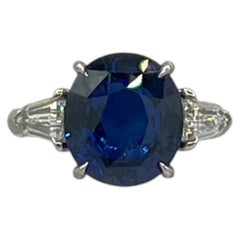 Blue Sapphire Oval and White Diamond Three Stone Ring in Platinum